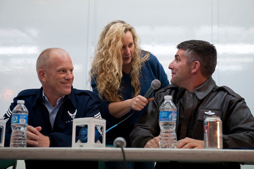 Ruby Riesinger, area director for Valdosta State University’s Small Business Development Center, speaks with U.S. Air Force Chief Master Sgts. Atticus Smith, 93d Air Group Operations Wings command chief, right, and Frank Batten, 23rd Wing command chief, during the Greater Valdosta Community Christmas Parade in Valdosta, Ga., Dec. 3, 2011. Riesinger asked the chiefs what their favorite part of Valdosta was, with them both agreeing on community support. During the parade, Smith and Batten served as float judges. (U.S. Air Force photo by Staff Sgt. Jamal D. Sutter/Released) 