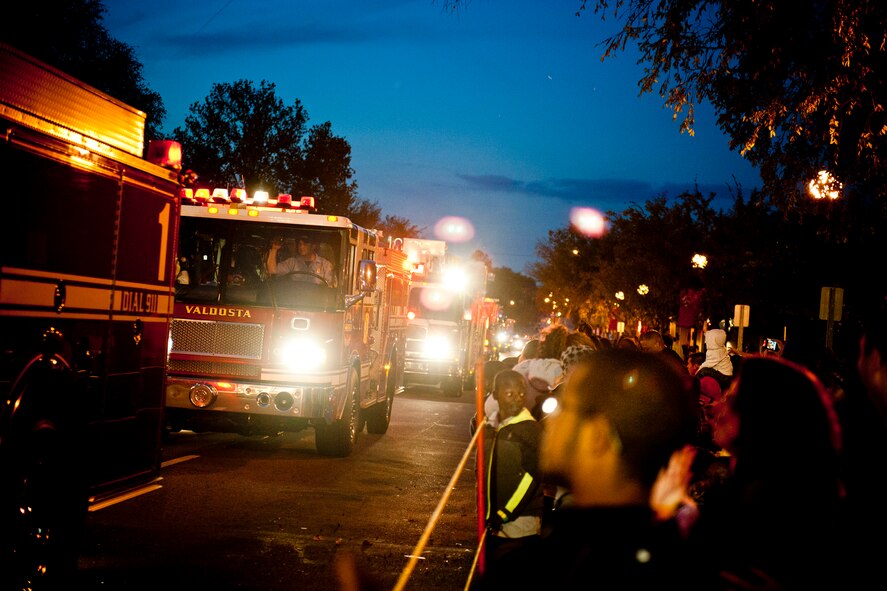 The Valdosta Fire Department makes their way down North Patterson Street during the Greater Valdosta Community Christmas Parade I in Valdosta, Ga., Dec. 3, 2011. The parade also included dozens of floats, vehicles, horses, demonstration teams and performances from high school bands. (U.S. Air Force photo by Staff Sgt. Jamal D. Sutter/Released) 