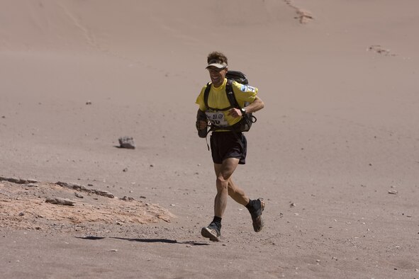 Dean Karnazes runs across the Atacama Desert in Chile during the Atacama Crossing, a 7-day, 250 kilometer race that he won in 2008.  Karnazes will be the featured guest at the 2012 Air Force Marathon Sports & Fitness Expo Sept. 13-14 at Wright State University's Nutter Center.   (courtesy image)