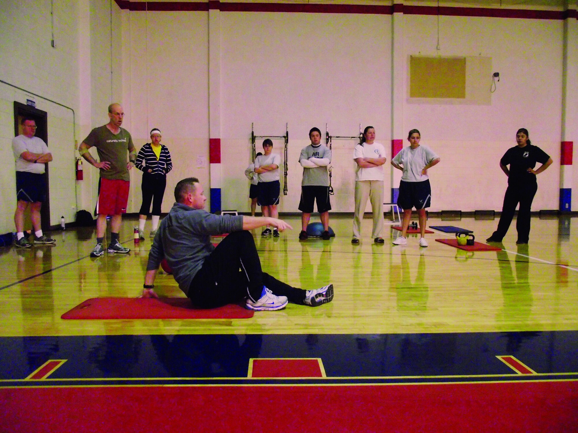 Keith Prince, instructor for the Total Resistance Exercise Cross Training class, speaks to a group of students Nov. 10 at the Kirtland Air Force Base East Fitness Center.