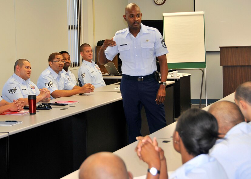 Chief Master Sgt. Cameron Kirksey, Command Chief for the 482nd Fighter Wing, addresses the Noncommissioned Officer Leadership Development Course at Homestead Air Reserve Base, Jan. 5. The objective of the course is to heighten the students' awareness of the dybnamics of supervision and leadership in the workplace. (US Air Force Photo/ Tech. Sgt. Ian Carrier)
