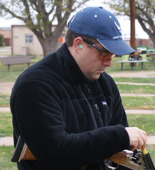 Maj. James Schmel loads his shotgun at the Sheppard AFB Skeet Range Dec. 4, 2011. Schmel has competed on the All Air-Force Skeet Shooting team since 2007. (U.S. Air Force photo/Dan Hawkins)