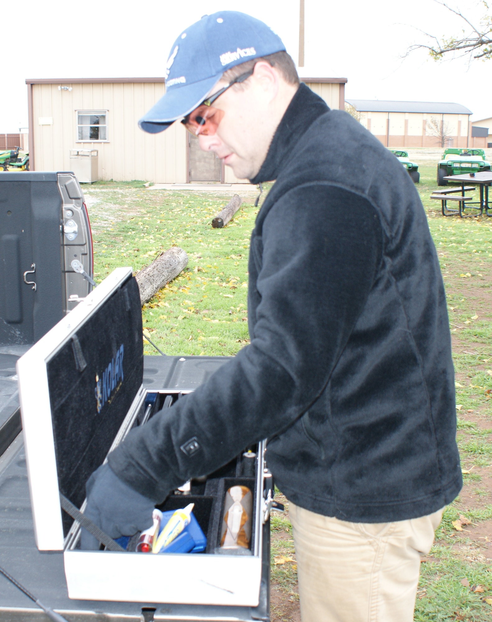 Maj. James Schmel preps for his practice round at the Sheppard AFB Skeet Range Dec. 4, 2011. Schmel has competed on the All Air-Force Skeet Shooting team since 2007. (U.S. Air Force photo/Dan Hawkins)