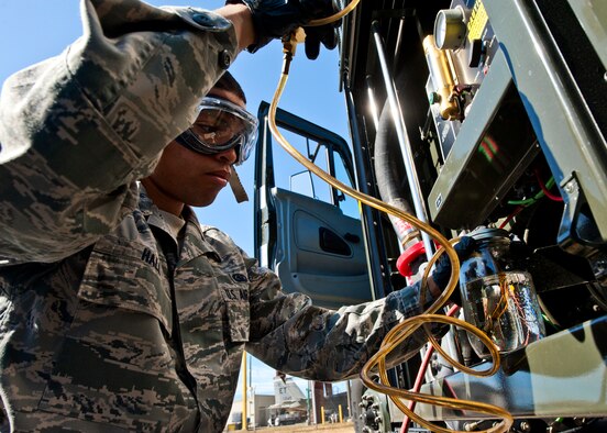 Airman 1st Class Troy Hall, with the 96th Logistics Readiness Squadron, takes a quart