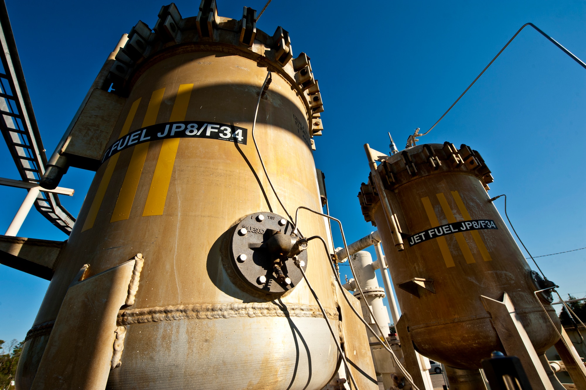 Large fuel filters used to clean the JP-8 jet fuel as it arrives to the base by barge are located at the edge of Weekly Bayou. The machine circulates the fuel at 1,200 gallons per minute before sending it into one of the bulk storage tanks. Eglin’s fuel is filtered twice before it is pumped into an aircraft. (U.S. Air Force photo/Samuel King Jr.)