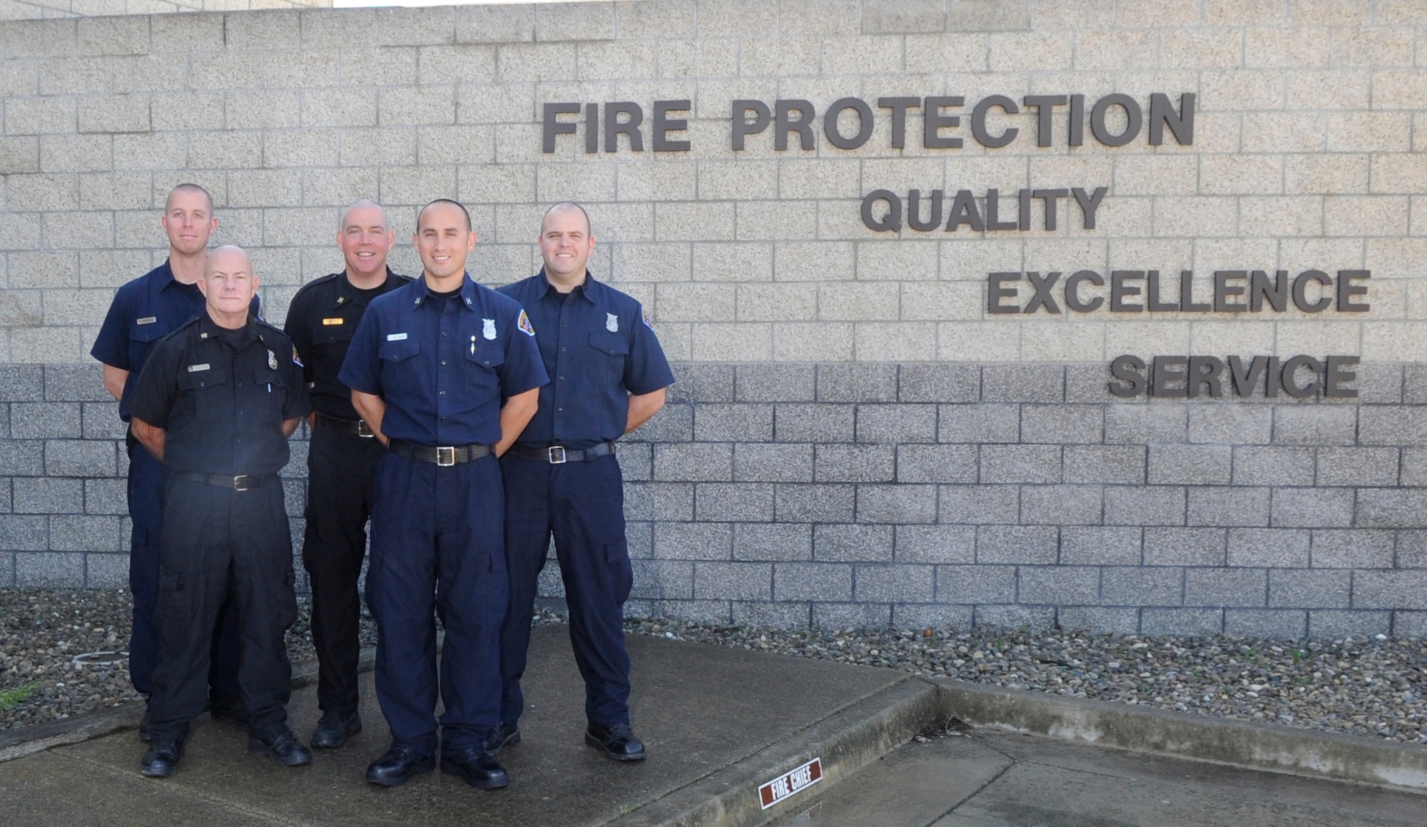 VANDENBERG AIR FORCE BASE, Calif. — Members from the Vandenberg Fire Department pose with their heads shaved here Wednesday, Nov. 30, 2011.  A total of 26 firefighters shaved their heads in honor of Ryan Raffel, the 5-year-old nephew of Vandenberg Fire Department firefighter Robert Raffel, who was diagnosed with Leukemia earlier this year. (U.S. Air Force photo/ Tech. Sgt. Scottie McCord)