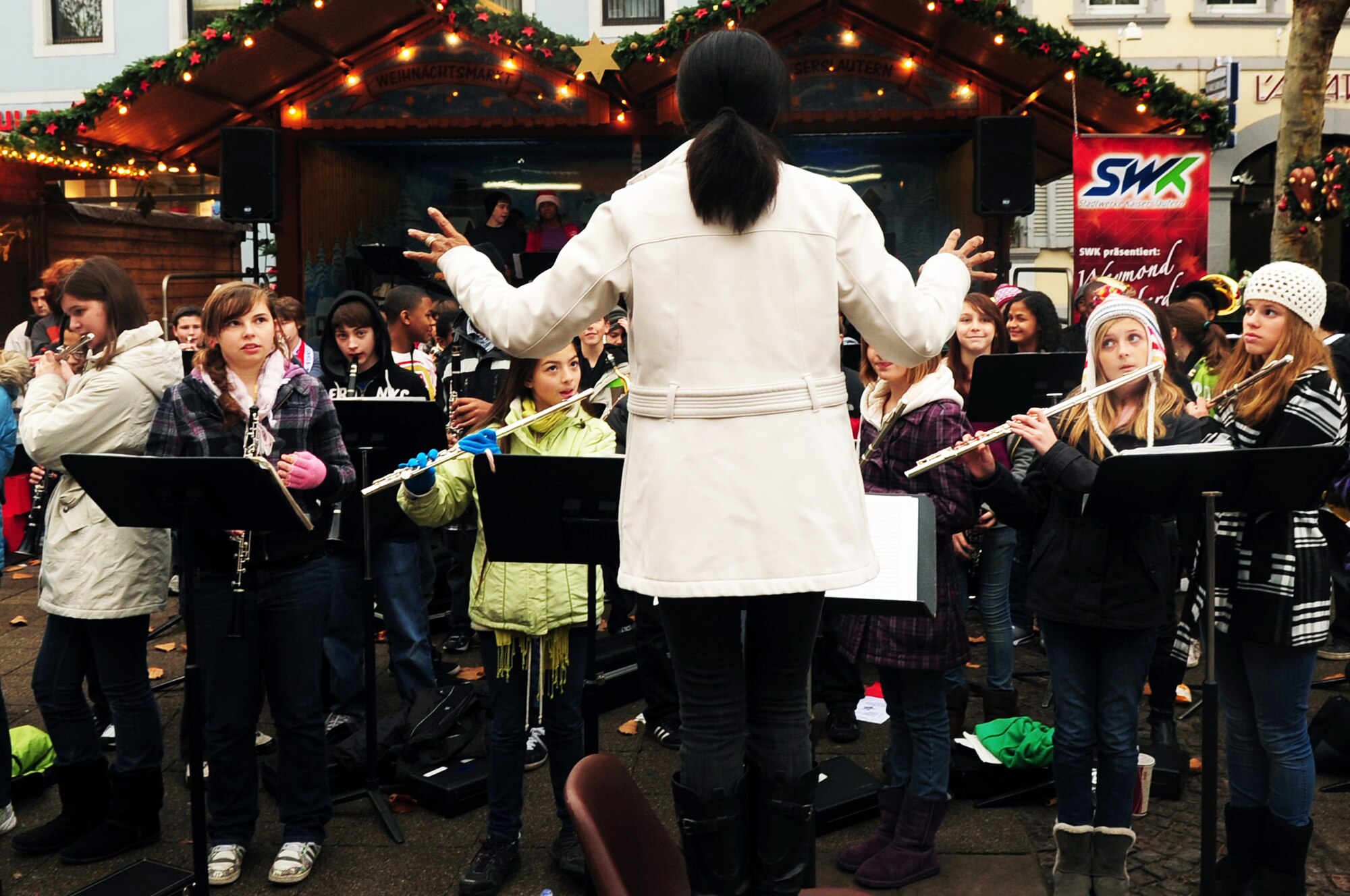 The Ramstein Middle School intermediate and advance band performs for the German and American community during the Christmas market in Kaiserslautern, Germany, Dec. 1, 2011. The market will be set up until Dec. 23 near Stiftskirche str. and on Schillerplatz str. (U.S. Air Force photo by Senior Airman Aaron-Forrest Wainwright)