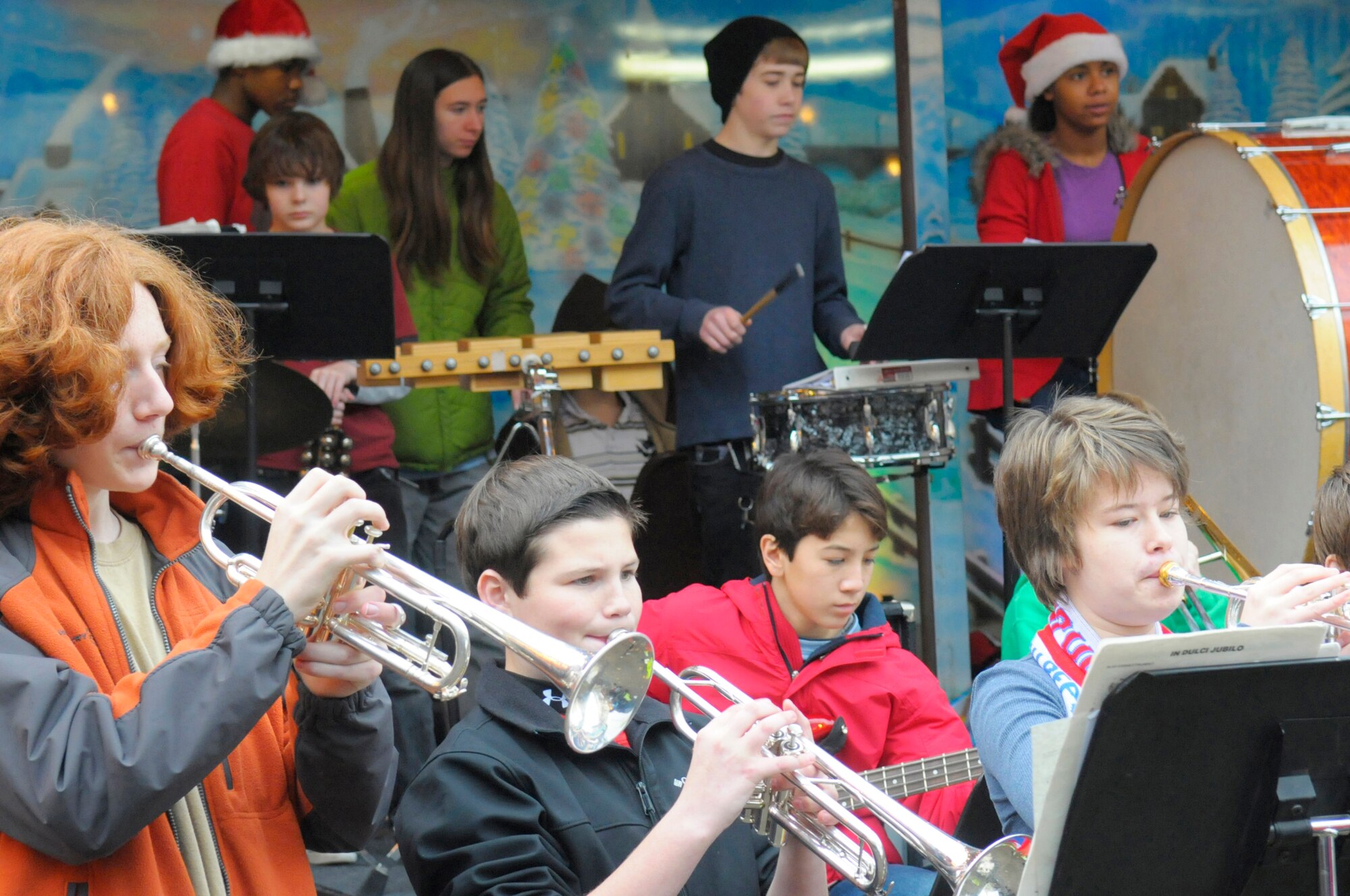 The Ramstein Middle School intermediate and advance band performs for the German and American community during the Christmas market in Kaiserslautern, Germany, Dec. 1, 2011. The market will be set up until Dec. 23 near Stiftskirche str. and on Schillerplatz str. (U.S. Air Force photo by Staff Sgt. Travis Edwards)