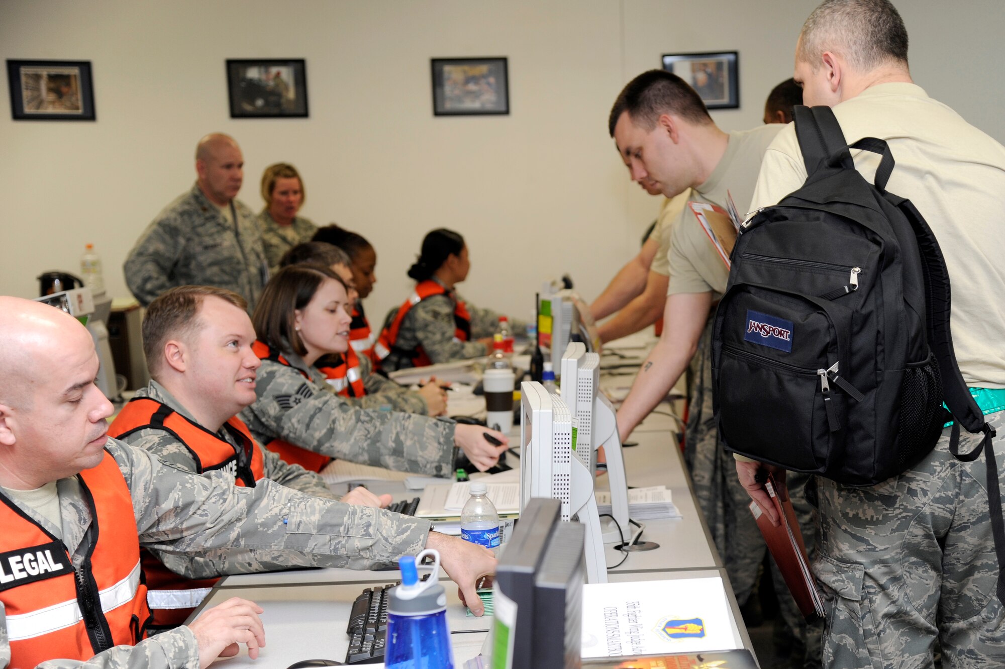 MISAWA AIR BASE, Japan - Airmen from a cross-section of the base participate in the personnel deployment function line portion of an inspection here Dec. 5. The Pacific Air Forces Inspector General team is in town to evaluate the airmen of the 35th Fighter Wing and their ability to deploy. (U.S. Air Force photo/Tech. Sgt. Marie Brown)