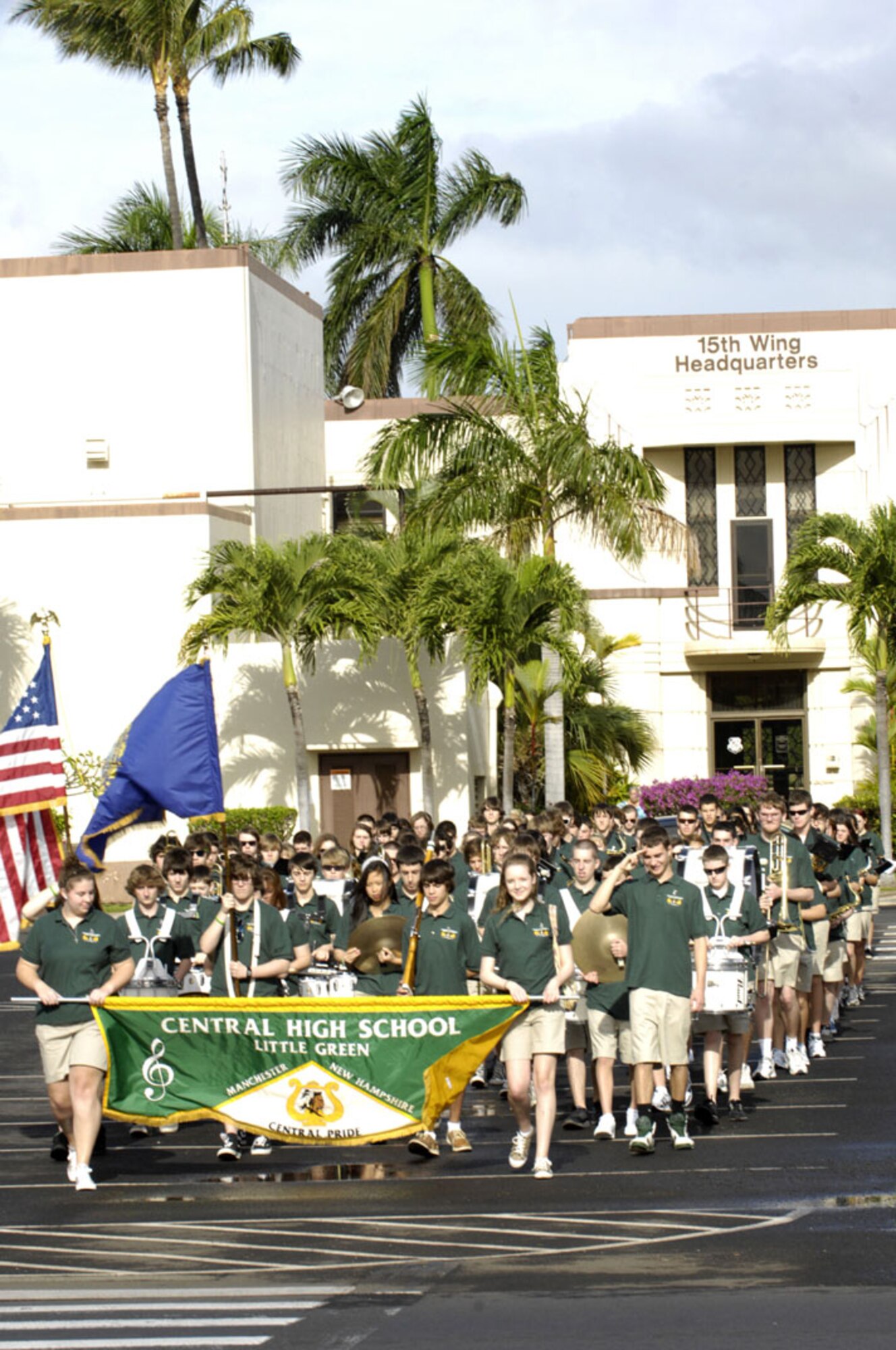 The Central High School Marching Band from Manchester, New Hampshire, pay tribute to fallen school alumni during a ceremony at Atterbury Circle, Joint Base Pearl Harbor-Hickam, Hawaii on Dec. 6, 2011. Joseph J. Jedrysik, David L. Crossett, and Joseph Rozmus were killed in action during the Dec. 7, 1941, attacks on Pearl Harbor and Hickam Field, Territory of Hawaii. (U.S. Navy photo/David D. Underwood, Jr.)