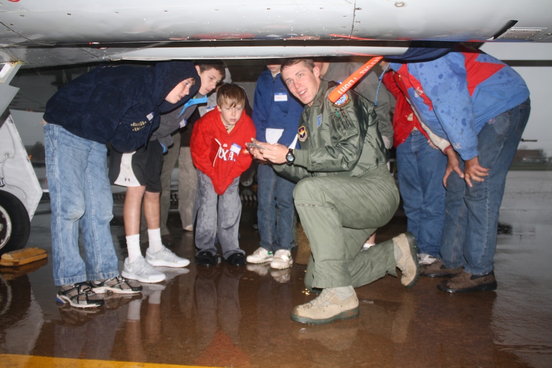 A student pilot shows local Boy Scouts how to conduct an aircraft pre-flight inspection for the T-38C Talon at Sheppard Air Force Base Dec. 3.