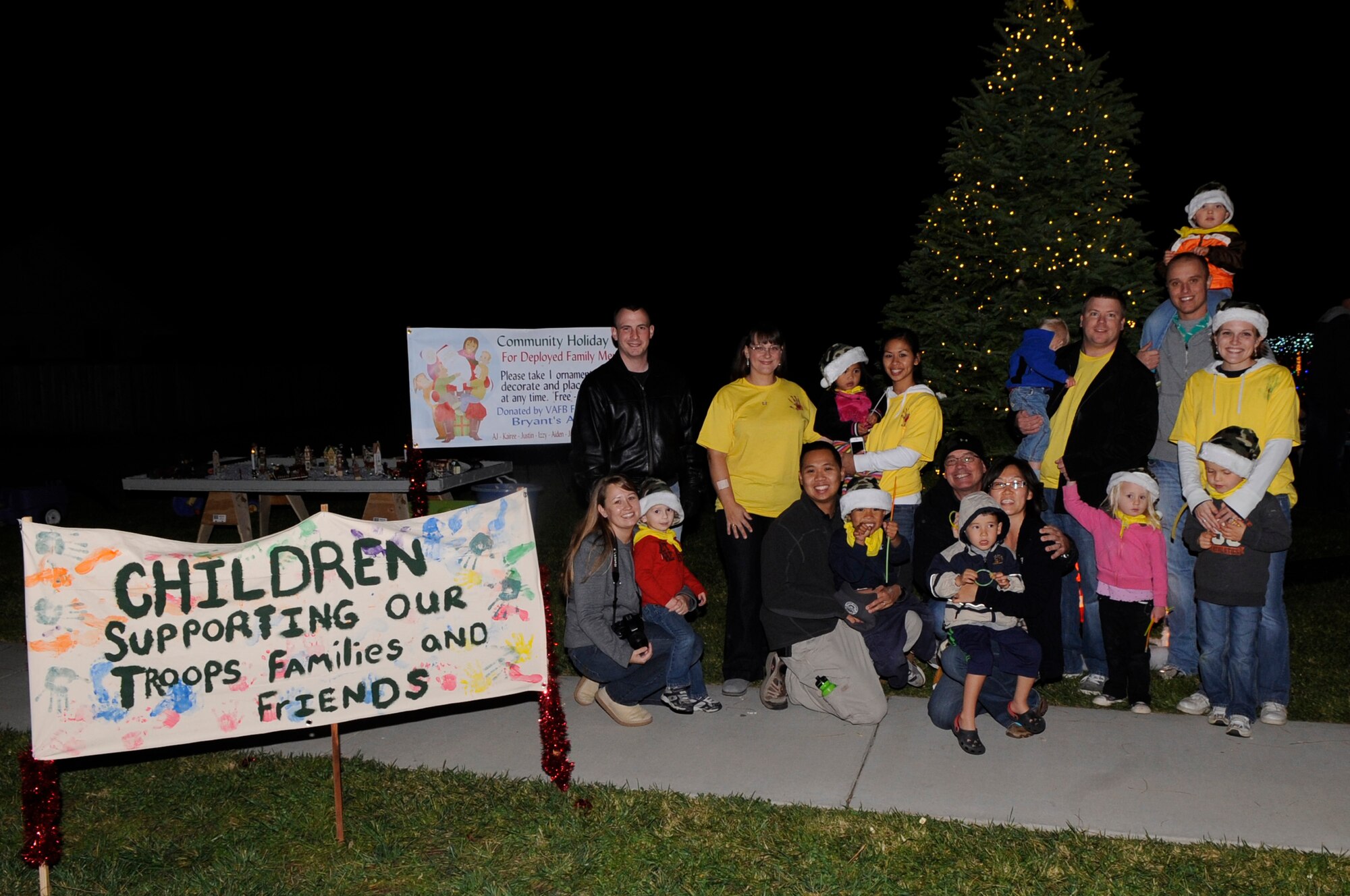 VANDENBERG AIR FORCE BASE, Calif. – The Vandenberg Air Force Base Family Child Care program along with the parents and children send a special thanks to all deployed service members and their families here Monday, Dec. 5, 2011. Families can make and place ornaments or hang a yellow ribbon on the Christmas tree for their deployed loved ones at 345 Oceanview Ave. thru Dec. 25. (U.S. Air Force photo/ Tech Sgt. Scottie T. McCord)