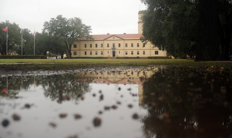 Two days of heavy rain caused flooding near the 2nd Bomb Wing Headquarters on Barksdale Air Force Base, La., Dec. 5. Bossier and Shreveport City have been on a water and fire ban for months due to drought received a much needed rain over the weekend. (U.S. Air Force photo/Airman 1st Class Andrew Moua)(RELEASED)