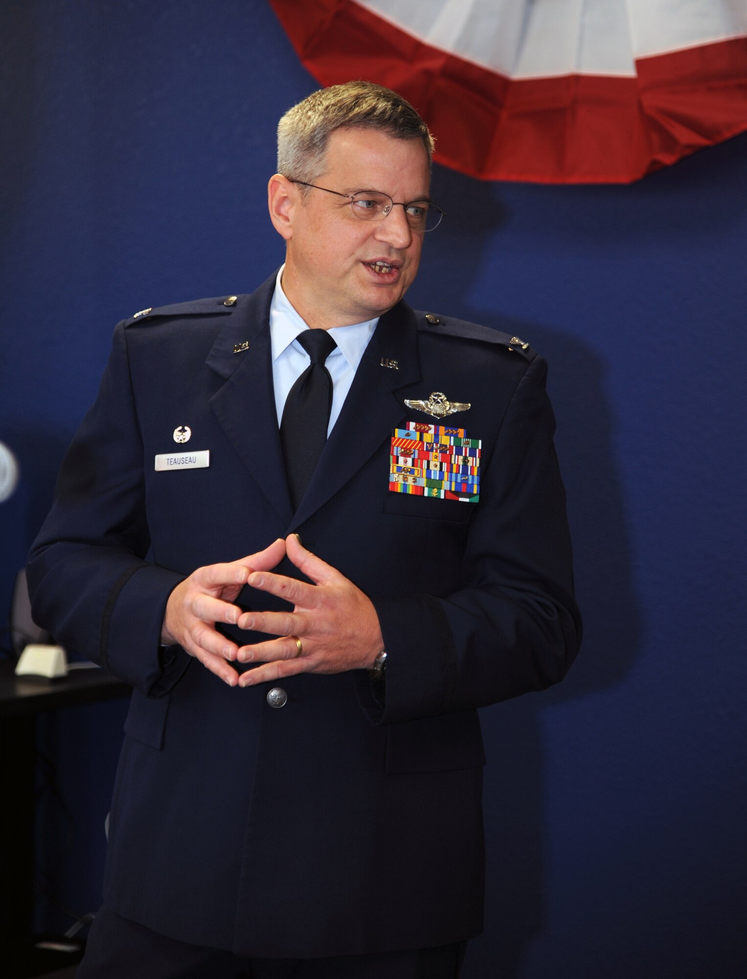 Col. Alan Teauseau, 442nd Mission Support Group commander, addresses the audience during a ribbon-cutting ceremony at the UCM Veterans Services Center, Dec. 6, 2011. The center is designed to help servicemembers and dependents more easily pursue a college degree. Teauseau presented a plaque with an A-10 Thunderbolt II 30 mm bullet on behalf of the 442nd Fighter Wing, Whiteman Air Force Base, Mo. The wing is an Air Force Reserve unit. (U.S. Air Force photo/Staff Sgt. Lauren Padden)