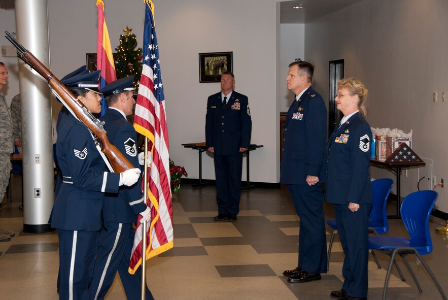 The 162nd Fighter Wing Honor Guard posts the colors at Senior Master Sgt. Brenda Chase's retirement ceremony Dec. 3. (U.S. Air Force photo/Master Sgt. Dave Dave Neve)