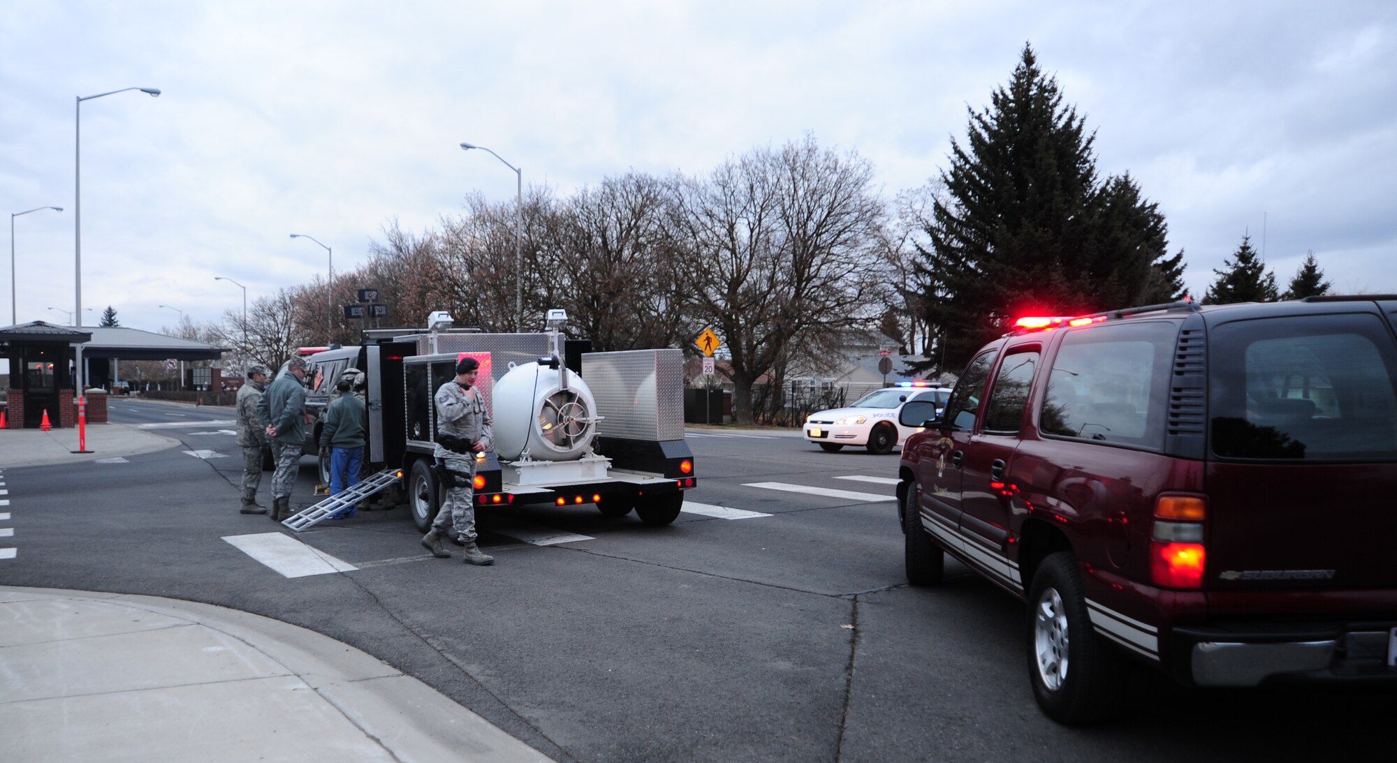 Fairchild emergency crews respond to an incident Saturday after a woman attempted to enter the base through the outbound lanes at the main gate. (U.S. Air Force photo/Airman First Class Taylor Curry)