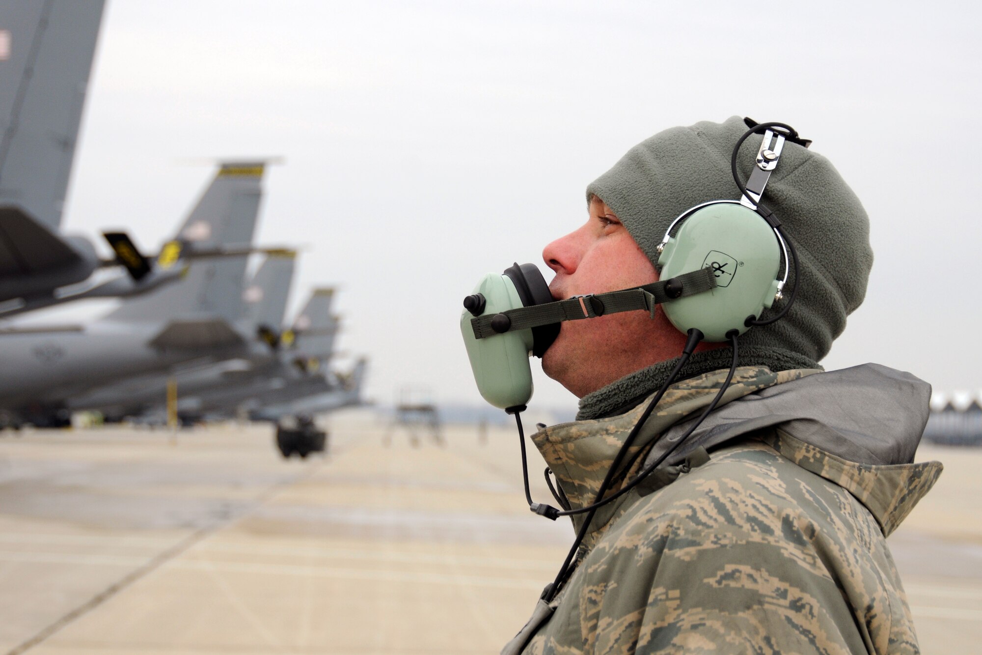 Senior Airman Shaun Hover, a crew chief with the 191st Aircraft Maintenance Squadron is in communication with the crew aboard a KC-135 Stratotanker at Selfridge Air National Guard Base, Mich., Dec. 3, 2011, as he helps to prepare the aircraft for a mission. Crew chiefs perform and coordinate a wide variety of maintenance tasks and prepare the aircraft for flight. (U.S. Air Force photo by TSgt. David Kujawa)