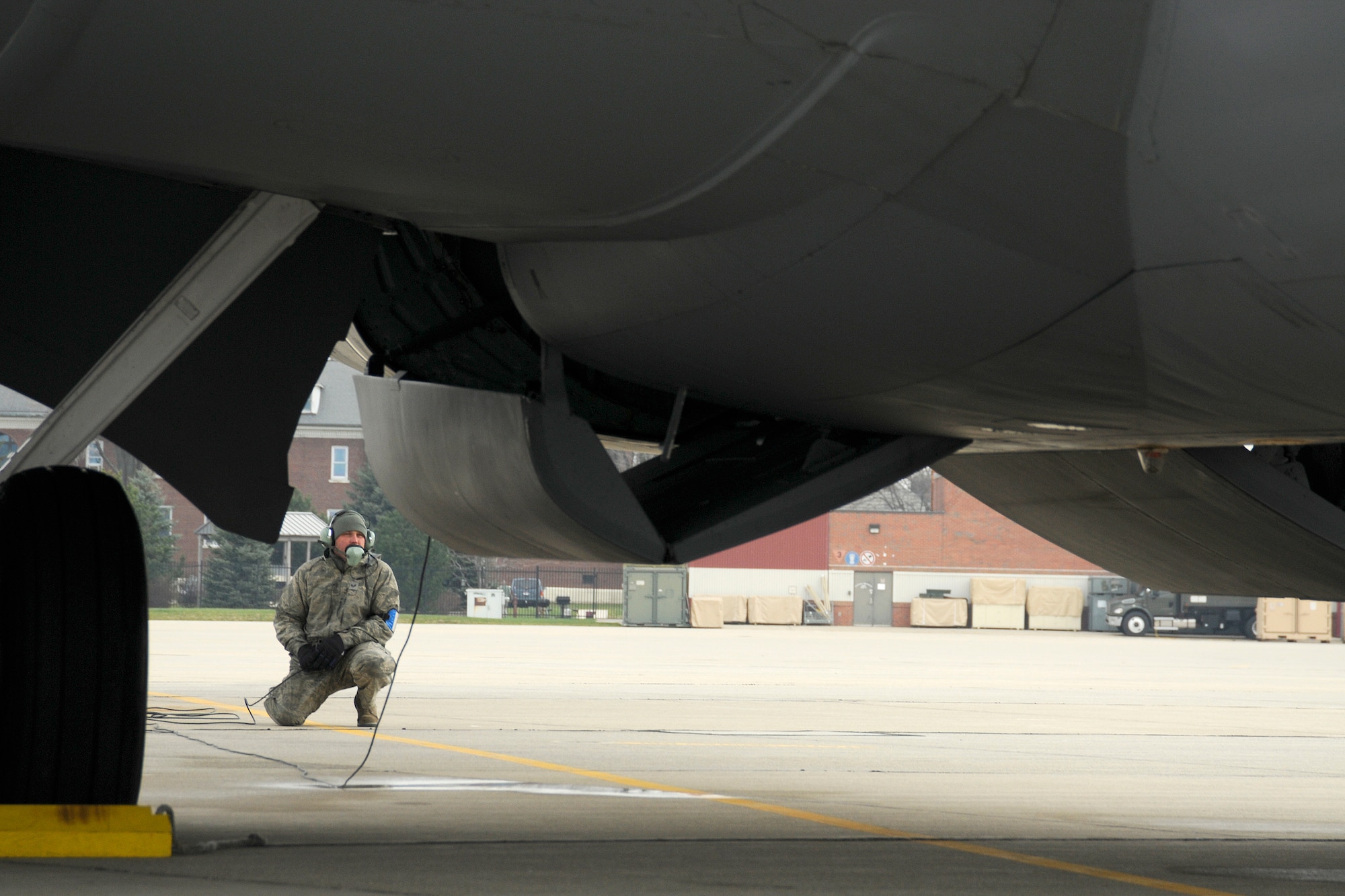 Senior Airman Shaun Hover, a crew chief with the 191st Aircraft Maintenance Squadron is in communication with the crew aboard a KC-135 Stratotanker at Selfridge Air National Guard Base, Mich., Dec. 3, 2011, as he helps to prepare the aircraft for a mission. Crew chiefs perform and coordinate a wide variety of maintenance tasks and prepare the aircraft for flight. (U.S. Air Force photo by TSgt. David Kujawa)