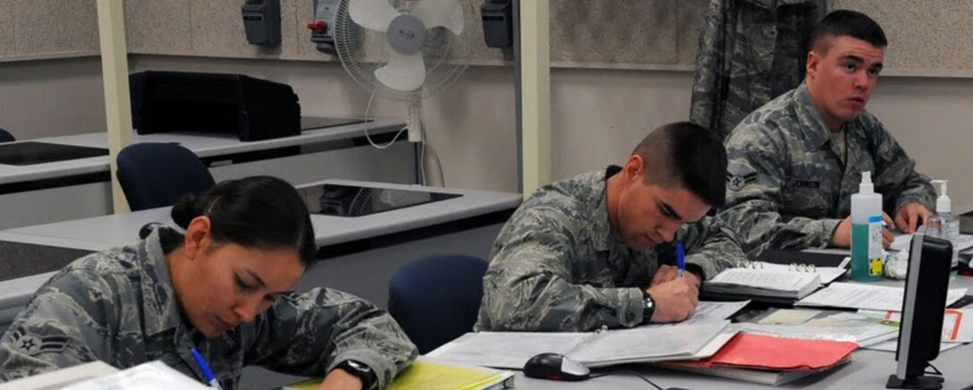 Students from the 365th Training Squadron at Sheppard AFB, Texas practice filling out forms during technical training on Dec 1, 2011. The Airmen are in the Avionics Attack Control Systems apprentice course. (U.S. Air Force photo/Josh Wilson)