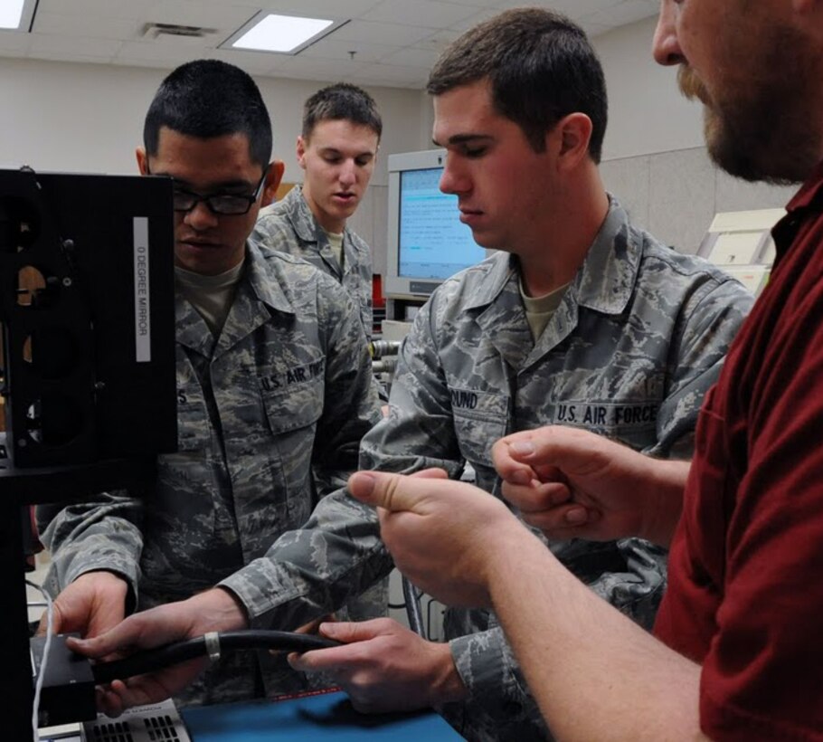 Students from the 365th Training Squadron at Sheppard AFB, Texas work on a training problem during technical training on Dec 1, 2011. The Airmen are in the Avionics Attack Control Systems apprentice course. (U.S. Air Force photo/Josh Wilson)