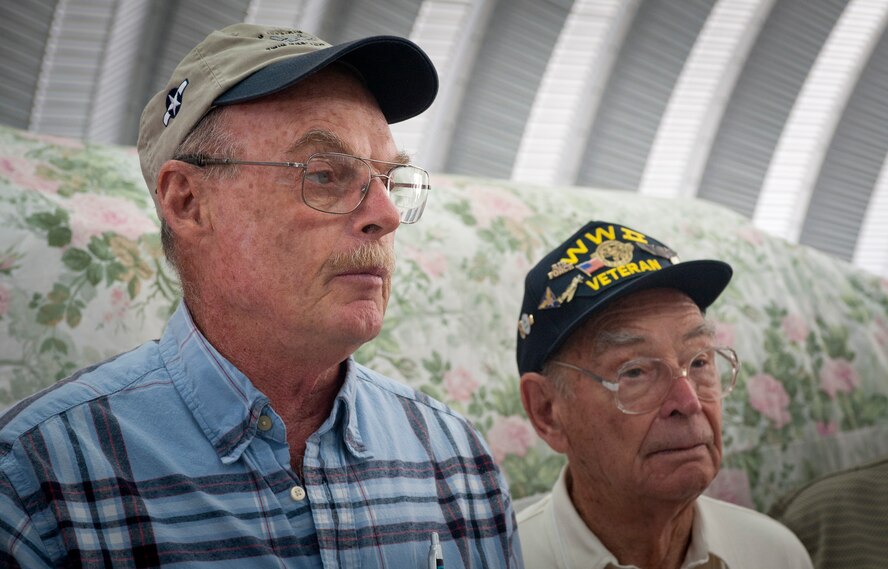 Tom Reilly, owner of the B-25 Group, talks to World War II veterans about his latest project to restore an XP-82 Twin Mustang in Douglas, Ga., Oct. 18, 2011. The P-82 was designed to escort B-29 Superfortress bombers during WWII but the war ended before production was complete. (U.S. Air Force photo by Airman 1st Class Jarrod Grammel/Released)

