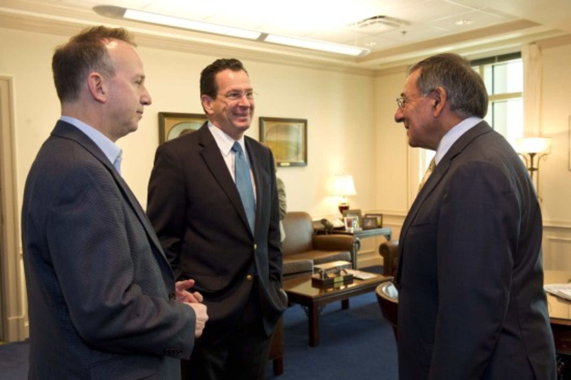 Delaware Governor Jack Markell (left), Connecticut Governor Dannel P. Malloy (middle), and U.S. Secretary of Defense Leon Panetta (right) at the Pentagon on Monday, Nov. 14, 2011, prior to the Governors' departure overseas. [Credit: Department of Defense]