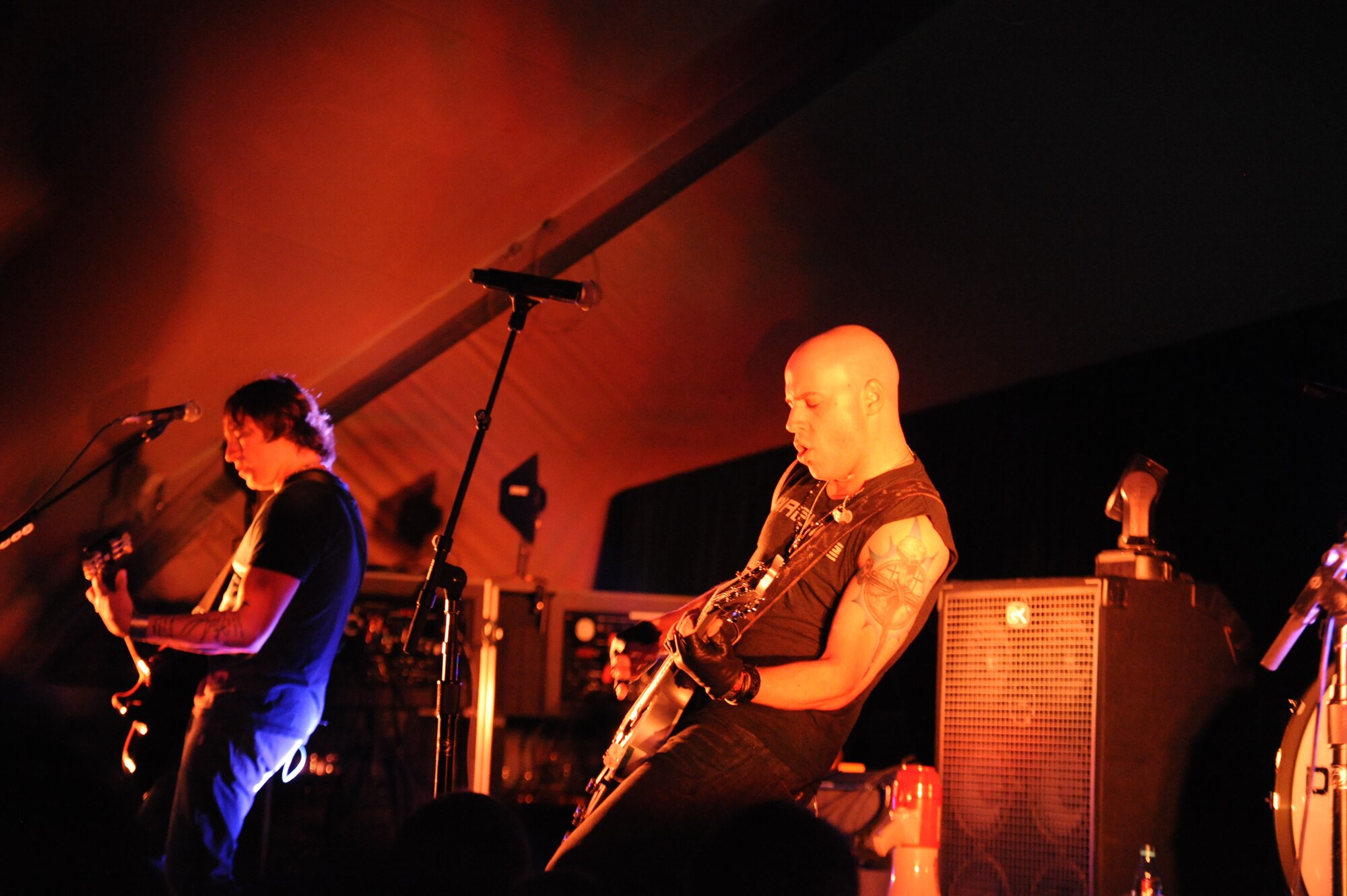 Chris Daughtry, lead singer for the band Daughtry, performs for service members during a concert at the Transit Center at Manas, Kyrgyzstan, Dec. 5. The band, comedian Gabriel Iglesias and members of the Band of the U.S. Air Force Reserve are on a 13-day tour playing six concerts that will take them through Southwest Asia and Europe to bring entertainment to American troops and their families as part of the Operation Seasons Greetings Tour for the Troops 2011. (U.S. Air Force photo/Tech. Sgt. Hank Hoegen)