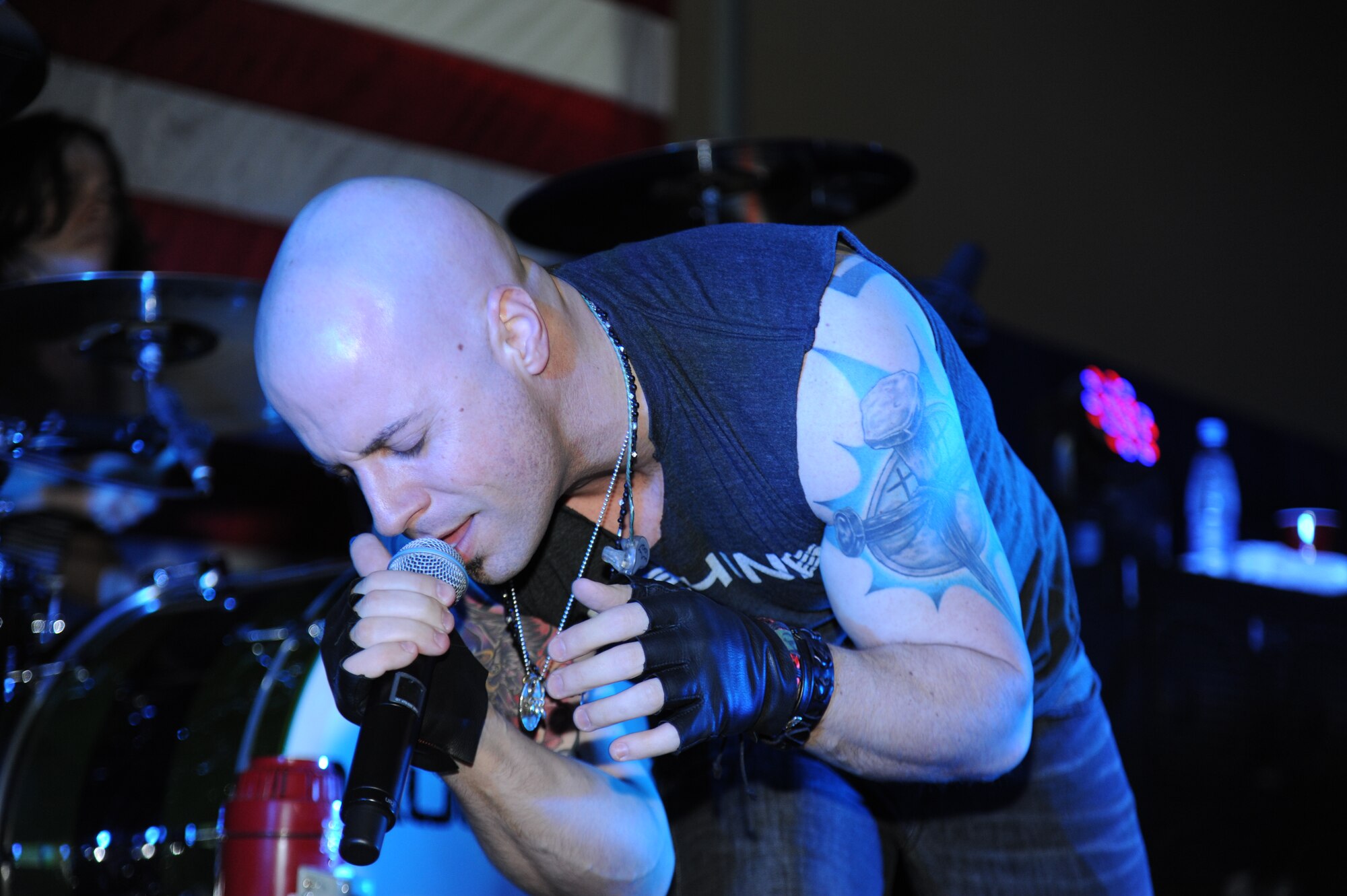 Chris Daughtry, lead singer for the band Daughtry, performs for service members during a concert at the Transit Center at Manas, Kyrgyzstan, Dec. 5. The band, comedian Gabriel Iglesias and members of the Band of the U.S. Air Force Reserve are on a 13-day tour playing six concerts that will take them through Southwest Asia and Europe to bring entertainment to American troops and their families as part of the Operation Seasons Greetings Tour for the Troops 2011. (U.S. Air Force photo/Tech. Sgt. Hank Hoegen)