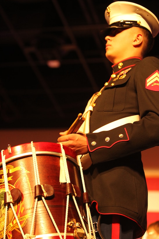 Cpl. Sean M. Cobbs, percussionist, Combat Center Band, waits for his cue to play in front of an audience of more than 3,000 people during their annual Holiday Concert at the Palm Springs Convention Center Dec. 7, 2011.