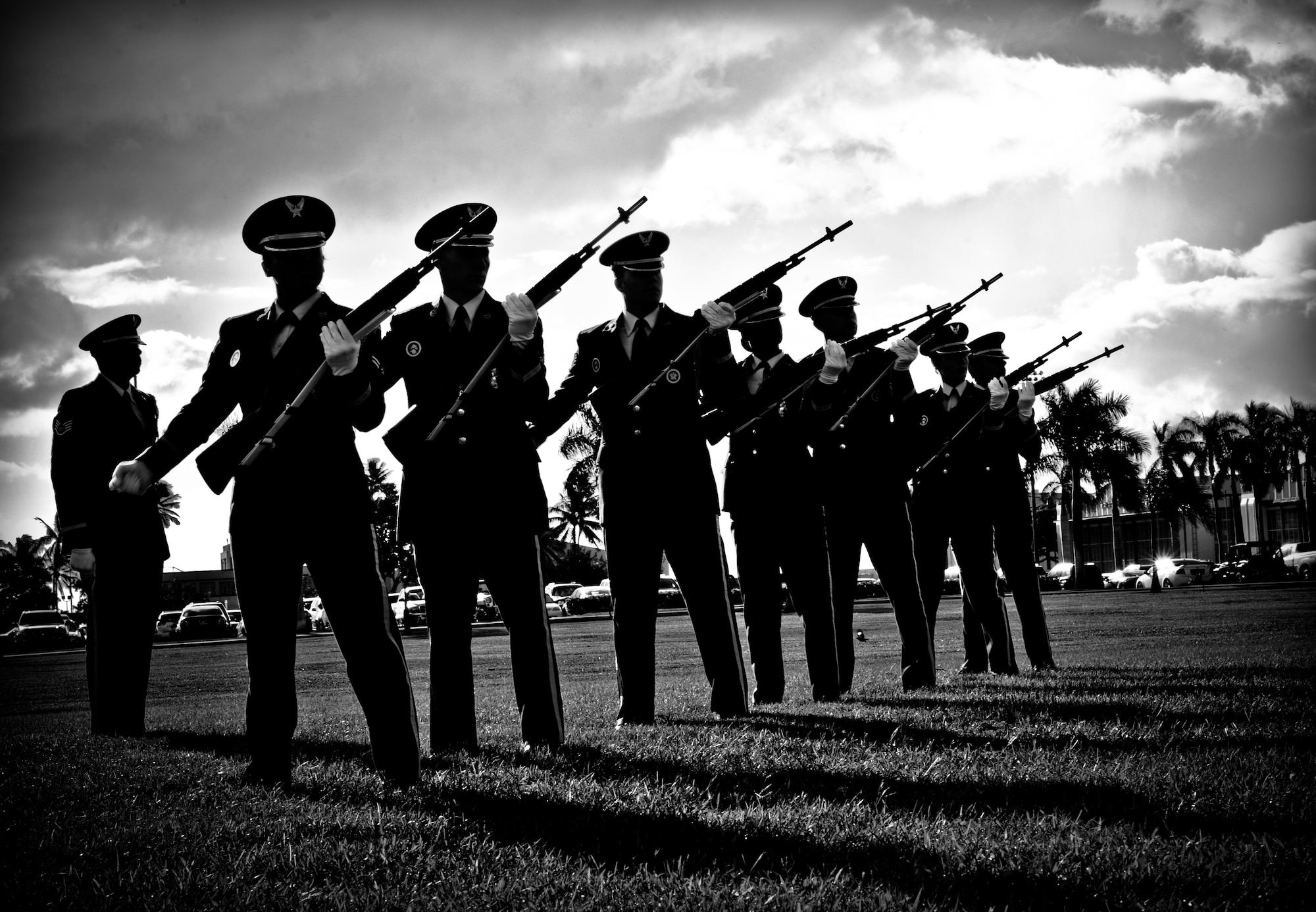 Members of the Joint Base Pearl Harbor-Hickam, Hawaii honor guard perform a three volley salute at the 70th Anniversary Remembrance Ceremony, commemorating the attack on Hickam on Field, now JBPHH, Dec.7, 2011. (U.S. Air Force photo/Senior Airman Lauren Main)