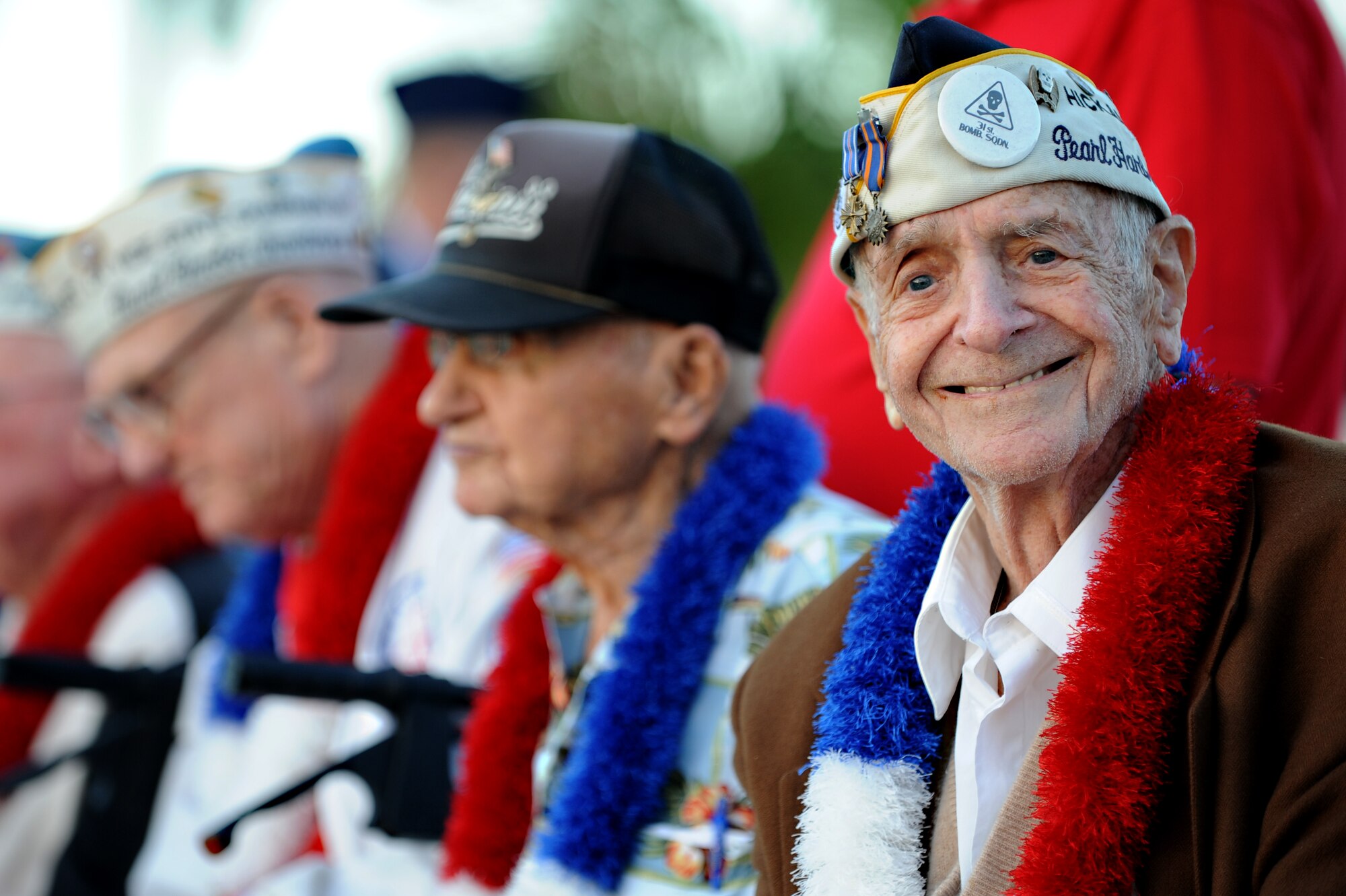 Lou Roffman, formely a technical sergeant with the U.S. Army Air Corps, grins for the camera before the 70th Anniversary Remembrance Ceremony of the attacks on Hickam Field, now Joint Base Pearl Harbor-Hickam, Hawaii, Dec. 7, 2011. Roffman was in rare form telling jokes to Airmen and performing magic tricks for kids at the event. (U.S. Air Force photo/Staff Sgt. Mike Meares) 

