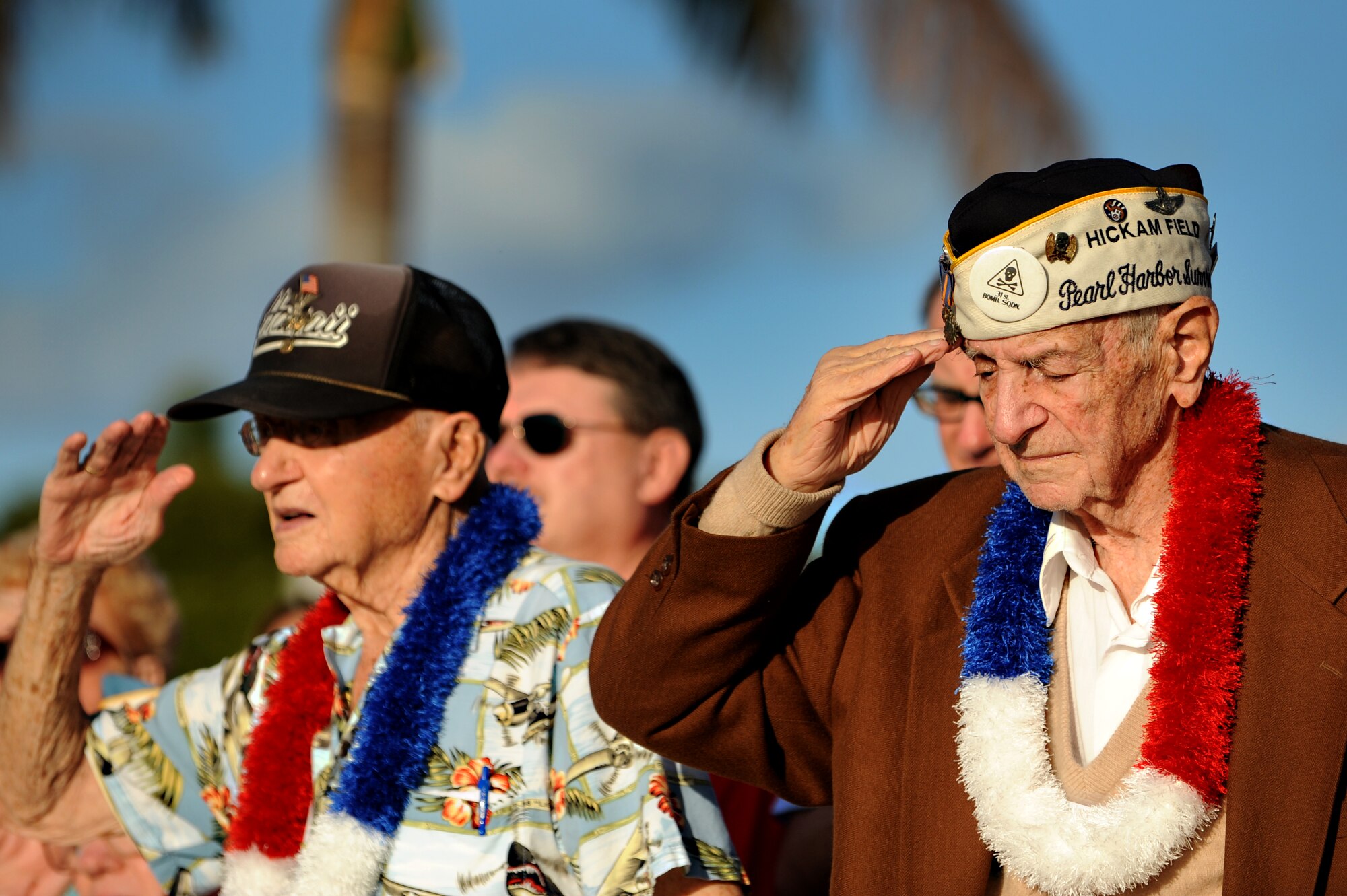 Lou Roffman, a former technical sergeant stationed at Hickam Field in 1941 during the infamous attacks on Oahu, salutes during the National Anthem at the 70th Remembrance Ceremony at Joint Base Pearl Harbor-Hickam, Hawaii, Dec. 7, 2011. (U.S. Air Force photo/Staff Sgt. Mike Meares)