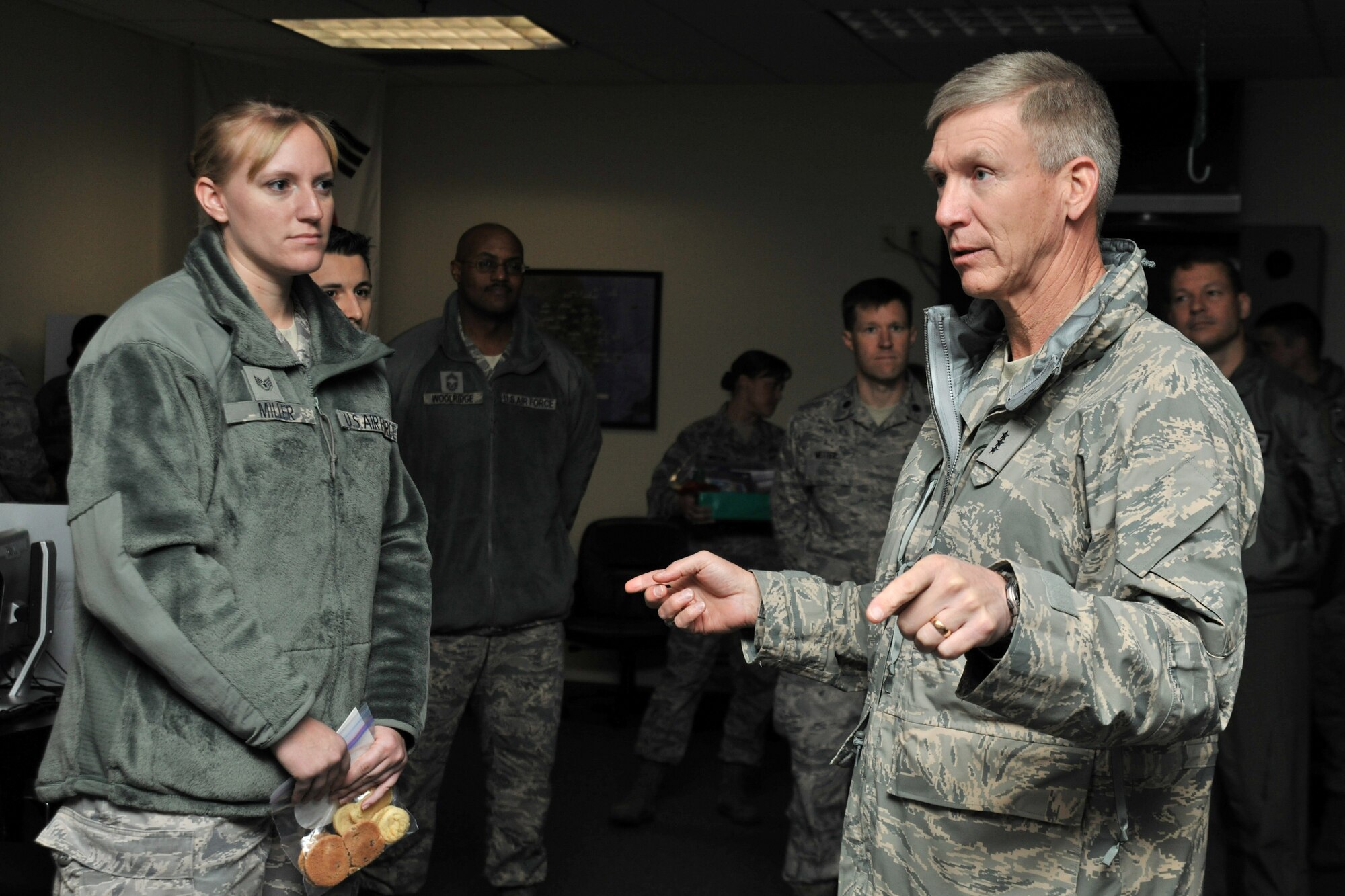 Lt. Gen. Jeffery Remington, 7th Air Force and Air Forces Korea commander, speaks to Airmen from the 8th Operations Group at Kunsan Air Base, Republic of Korea, Dec. 5, 2011. During his visit, Remington handed out Christmas cards and cookies to Airmen. (U.S. Air Force photo by Senior Airman Brittany Y. Auld/Released)