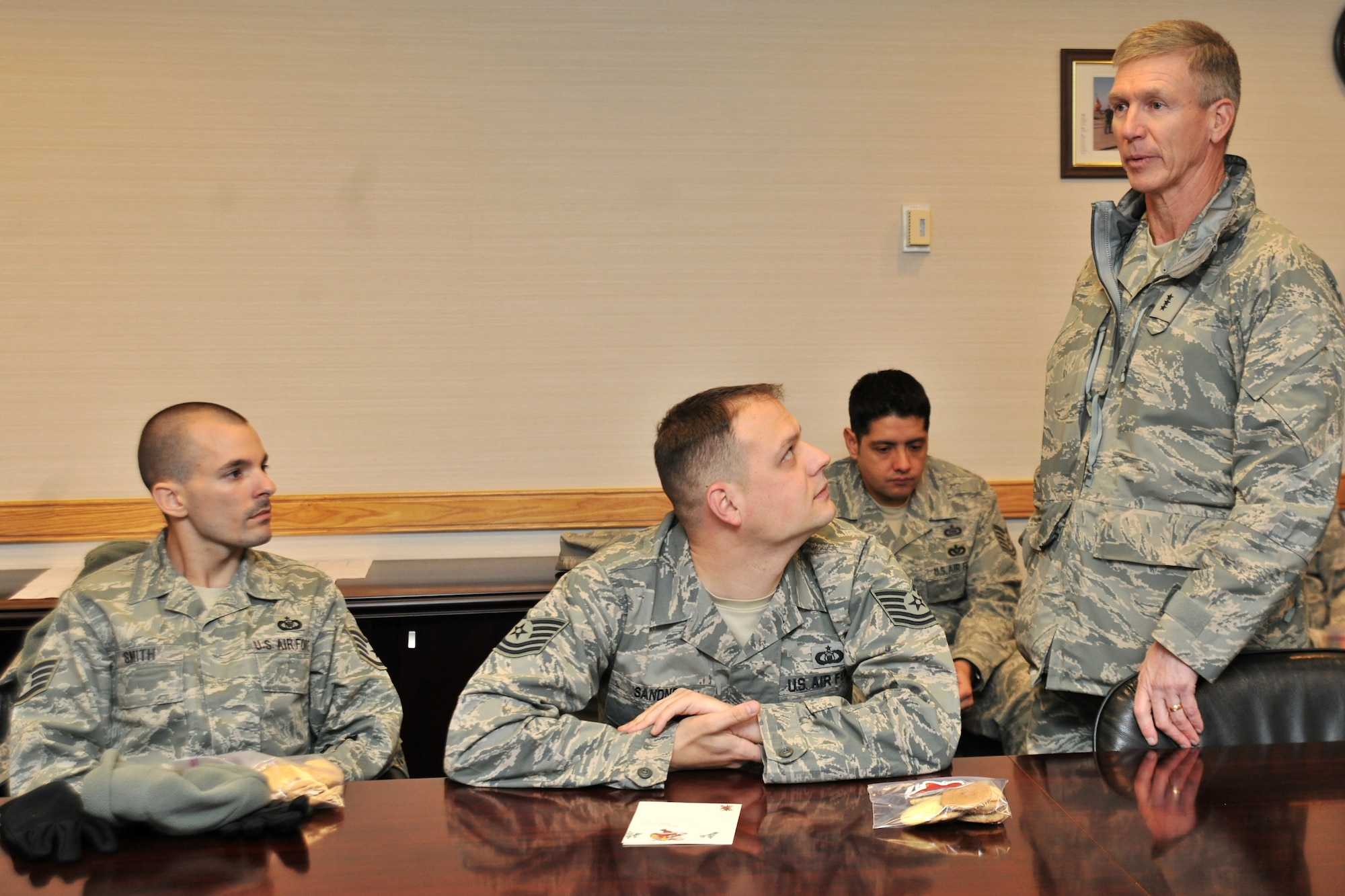 Lt. Gen. Jeffery Remington, 7th Air Force and Air Forces Korea commander, speaks to Airmen from the 8th Operations Group at Kunsan Air Base, Republic of Korea, Dec. 5, 2011. During his visit, Remington handed out Christmas cards and cookies to Airmen. (U.S. Air Force photo by Senior Airman Brittany Y. Auld/Released)