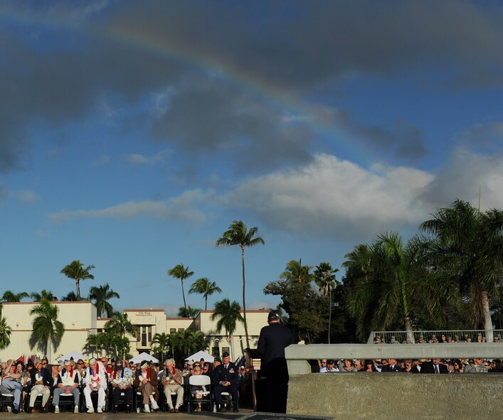 Gary North, Pacific Air Forces commander, speaks during a 70th Anniversary Remembrance Ceremony, commemorating the attacks on Hickam Field, now Joint Base Pearl Harbor-Hickam, Hawaii, Dec. 7, 2011. During the ceremony, a light mist began to rain down over the crowd, which is considered a Hawaiian blessing, leaving a rainbow behind. (U.S. Air Force photo/Staff Sgt. Mike Meares/Released)

