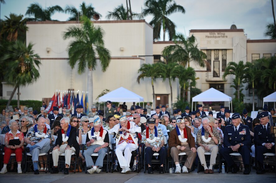 Service members and Hickam Field survivors of the attacks on Dec. 7, 1941 fill Atterbury Circle during a 70th Anniversary Remembrance Ceremony on Joint Base Pearl Harbor-Hickam, Hawaii, Dec. 7, 2011. During the attacks, 189 Army Air Corps Airmen and civilians lost their lives and 303 were wounded. (U.S. Air Force photo/Staff Sgt. Mike Meares/Released)
