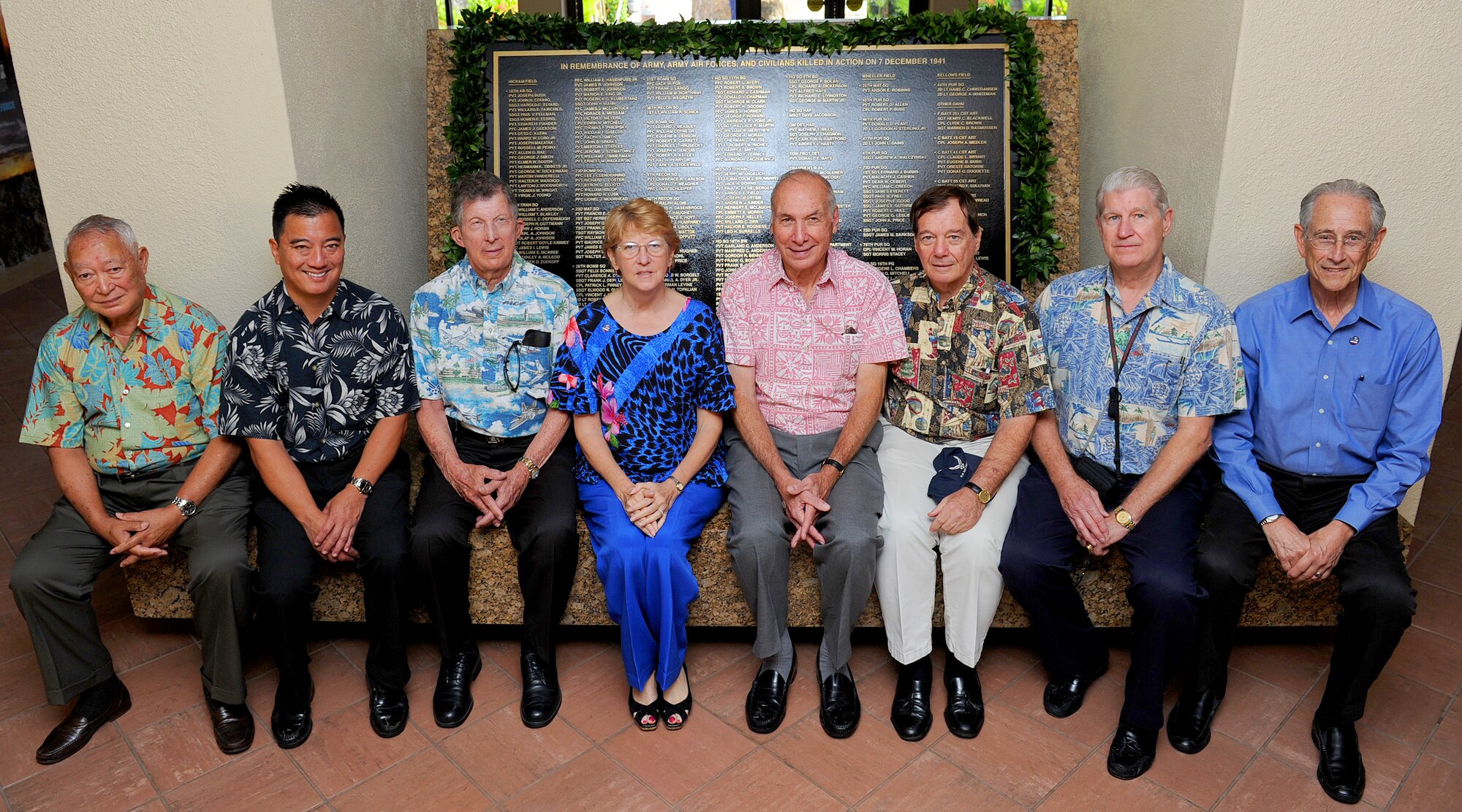 Air Force Civilian Advisory Council members in front of a newly unveiled plaque in the Courtyard of Heroes, Pacific Air Forces Headquarters building, Joint Base Pearl Harbor-Hickam, Hawaii, Dec. 7, 2011- a day marking the 70th anniversary of the 1941 attacks on Oahu. The plaque memorializes the 238 Army and Army Air Forces service members and civilians killed in those attacks.  (U.S. Air Force photo/Tech. Sgt. Jerome S. Tayborn/Released)