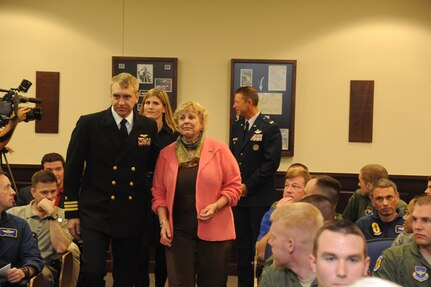 Navy Comdr. Brian Danielson escorts his mother, Mary, back to her seat
following the unveiling of the display memorializing her late husband Capt.
Benjamin F. Danielson Dec. 2. The 558th Flying Training Squadron dedicated
their auditorium to Captain Danielson, a former member of the 558th, who was
killed after his plane was shot down Dec. 5, 1969 in Laos during the Vietnam
War.  The subsequent rescue mission to save Captain Danielson and his
weapons systems officer, 1st Lt. Woody Bergeron, stands as the largest
combat search and rescue operation in the history of the U.S. Air Force.