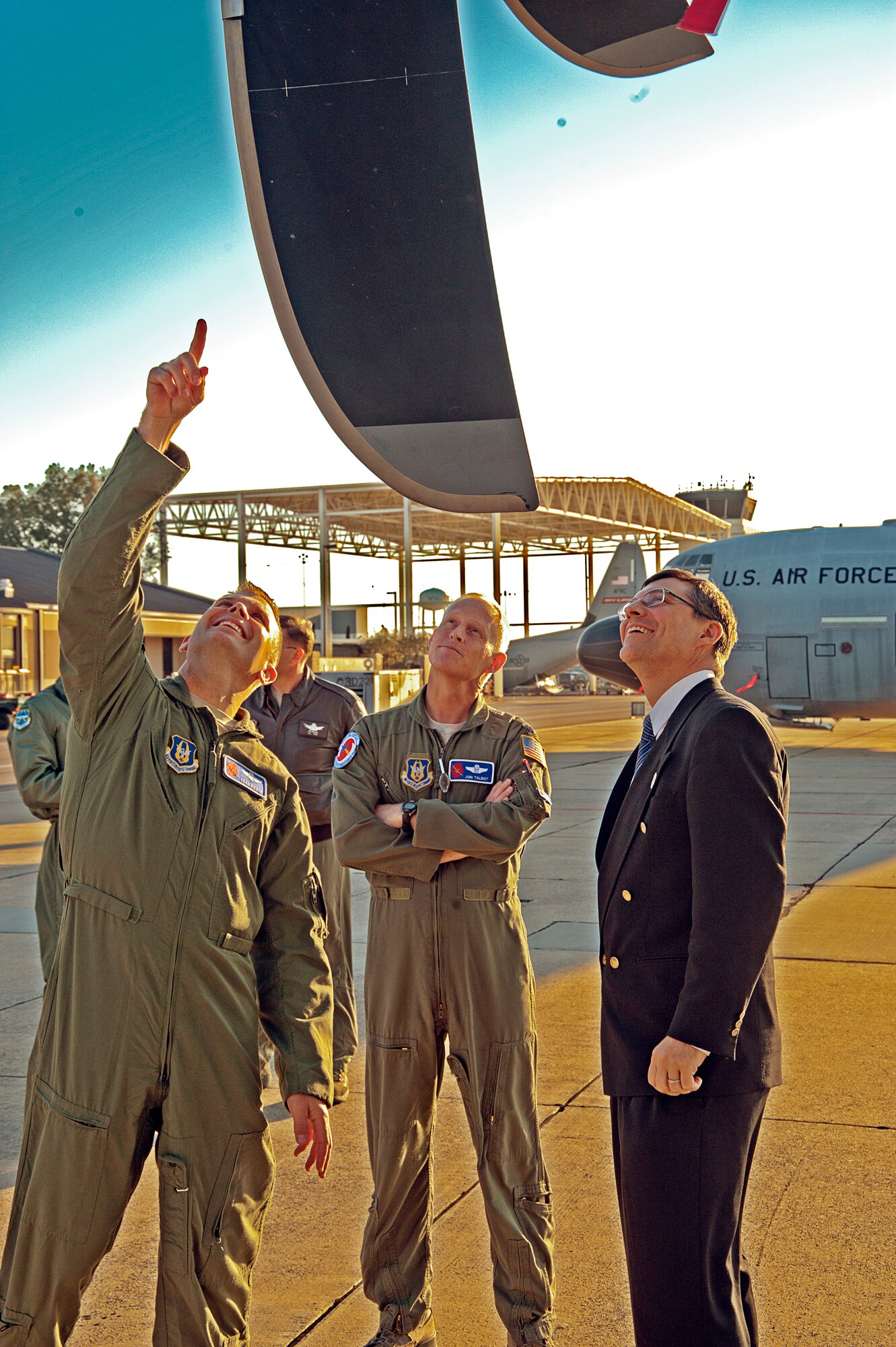 The 53rd Weather Reconnaissance Squadron director of operations, Lt. Col. Sean Pierce, points out the unique features of a WC-130J propeller to the U.S. Air Force Chief Scientist, Dr. Mark T. Maybury. Pierce and Lt. Col. John Talbot, 53rd WRS chief weather officer, met with Dr. Maybury during his trip to visit the squadron Dec. 1. (U.S. Air Force photo by Maj. Heather Newcomb)
