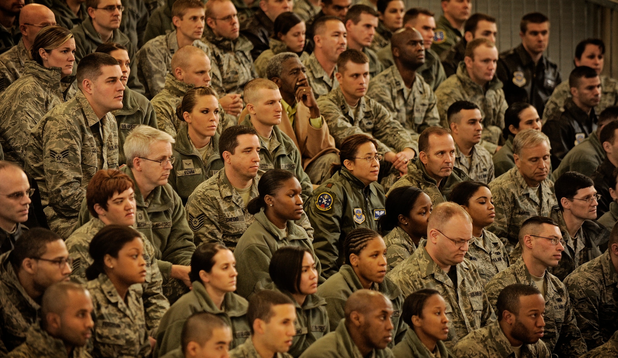 Members of the 375th Air Mobility Wing listen intently as Lt. Gen. Mark F. Ramsay, 18th Air Force Commander, replies to a question from an audience member about the future financial issues in the Air Force during an all-call at Scott Air Force Base, Ill. Dec 2. General Ramsay recently took command of the 18th Air Force and was invited to tour the 375th Air Mobility Wing, meeting Airmen and speaking to them about issues we are facing in the Air Force today. (U.S. Air Force photo/ Staff Sgt. Ryan Crane)