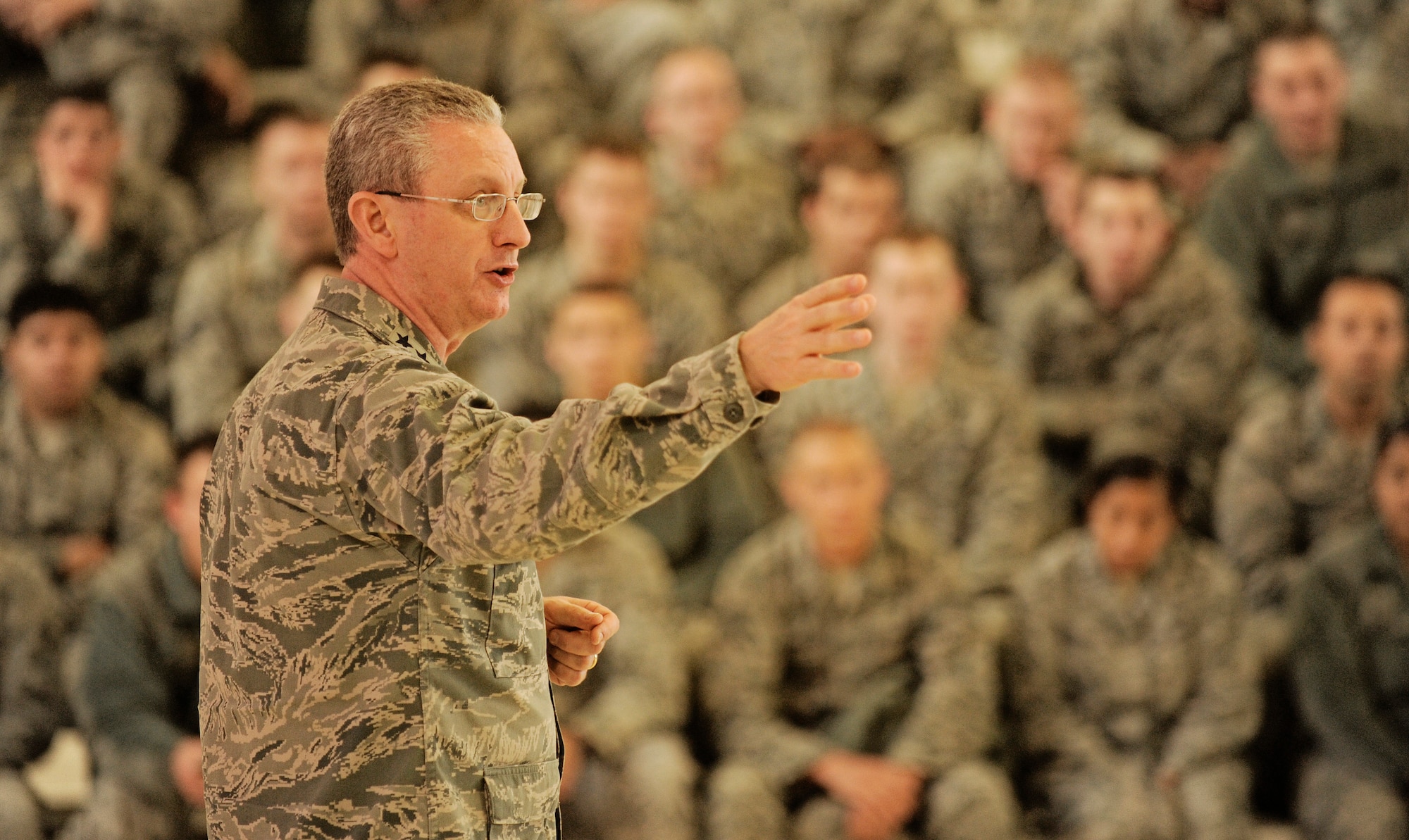 Lt. Gen. Mark F. Ramsay, 18th Air Force Commander, replies to a question from an audience member about the future financial issues in the Air Force during an all-call at Scott Air Force Base, Ill. Dec 2. General Ramsay recently took command of the 18th Air Force and was invited to tour the 375th Air Mobility Wing, meeting Airmen and speaking to them about issues we are facing in the Air Force today. (U.S. Air Force photo/ Staff Sgt. Ryan Crane)