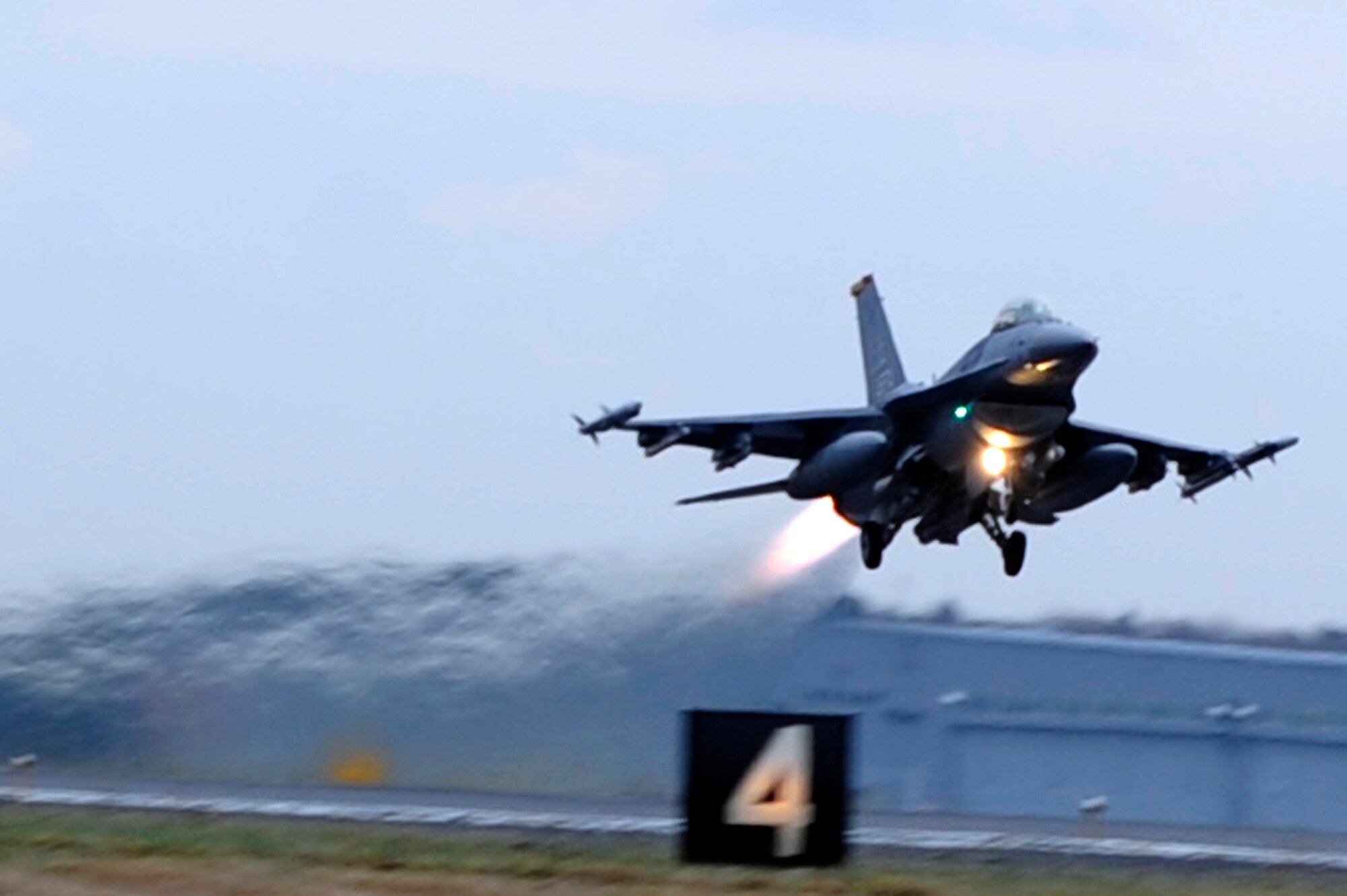MISAWA AIR BASE, Japan - An F-16 Fighting Falcon with the 35th Fighter Wing takes off during an operational readiness inspection here Dec. 7. Airmen-warriors of the 35 FW are currently being inspected on their ability to survive and operate in a wartime environment. (U.S. Air Force photo/Tech. Sgt. Marie Brown)