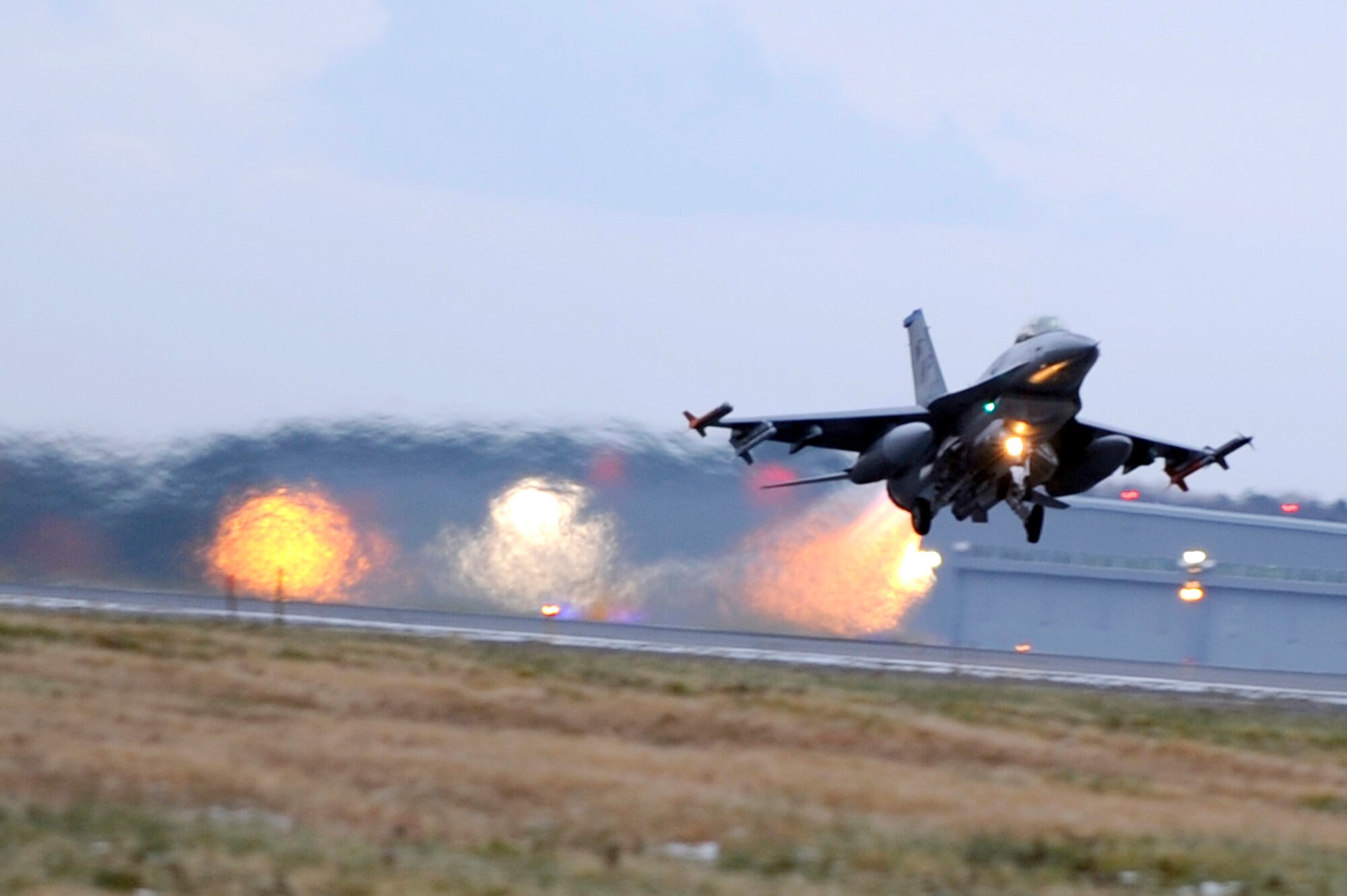 MISAWA AIR BASE, Japan - An F-16 Fighting Falcon from the 35th Fighter Squadron out of Kunsan Air Base, Korea takes off to participate as an aggressor during an operational readiness inspection here Dec. 7. Misawa is in the phase II portion of their ORI as they are evaluated on their ability to survive and operate in a wartime environment. (U.S. Air Force photo/Tech. Sgt. Marie Brown)