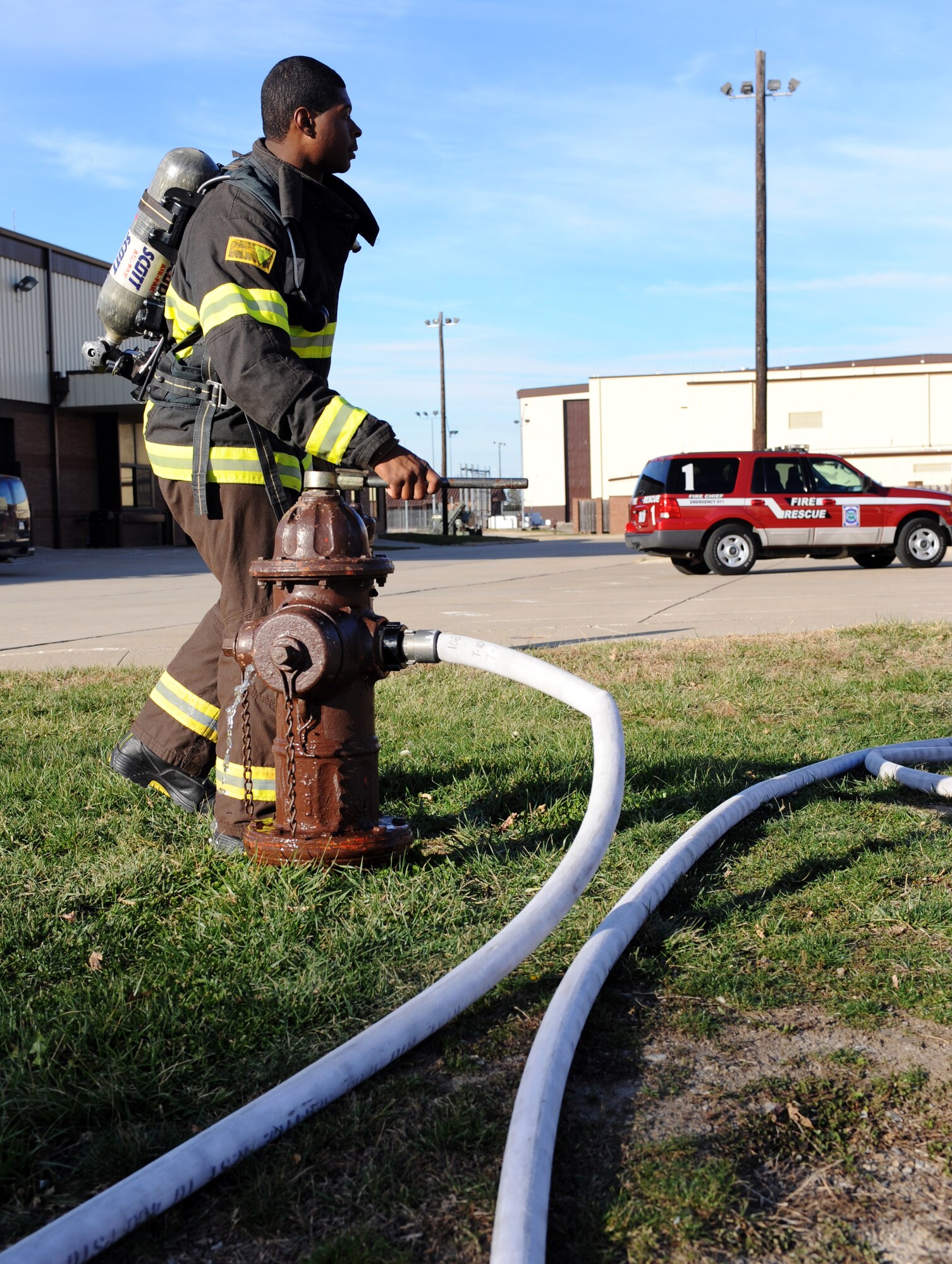 WHITEMAN AIR FORCE BASE, Mo. - - Staff Sgt. Derrick Allen opens the fire hydrant while doing circuit training to keep his skills sharp Nov. 30. The Whiteman AFB team of Allen, Vanden Haak, Airman 1st Class Anthony Beaudry, Master Sgt. Mark Belton, and Christopher Finkes earned the silver medal this year at the world firefighter competition at Myrtle Beach, S.C. The challenge requires maximum effort in minimal time as it simulates the exertion needed to fight a fire and rescue a victim on a timed course. Allen is a fire protection specialist assigned to the 509th Civil Engineer Squadron, Fire Protection Flight. (U.S. Air Force photo/Senior Airman Laura Goodgame) 