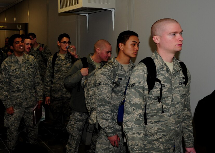 MINOT AIR FORCE BASE, N.D. -- Airmen of the 5th Bomb Wing process through the base terminal before they deploy here Dec. 2. These Airmen headed to Andersen Air Force Base, Guam, as part of U.S. Pacific Command’s Continuous Bomber Presence. (U.S. Air Force photo/Senior Airman Michael J. Veloz)