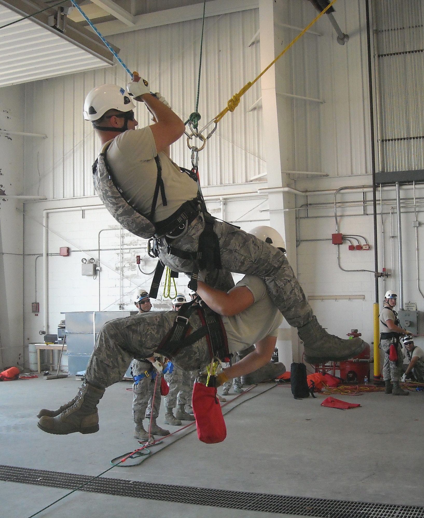 Members of the 188th Fire Emergency Services Flight and the 138th Fire Emergency Services Flight conduct Urban Search and Rescue training at the 188th Fighter Wing in Fort Smith, Ark., Sept. 30, 2011. Fifteen members of the 188th and 10 Airmen with the 138th, an Air National Guard unit based in Tulsa, Okla., completed the two-week training course as part of the Rescue One certification process. The Airmen will complete additional training at the 188th later in the year as part of the Rescue Two certification. The training site at the 188th is one of two Air National Guard facilities in the nation that conduct this particular training. (U.S. Air Force photo by Senior Airman Michael Rutherford/188th Fighter Wing)