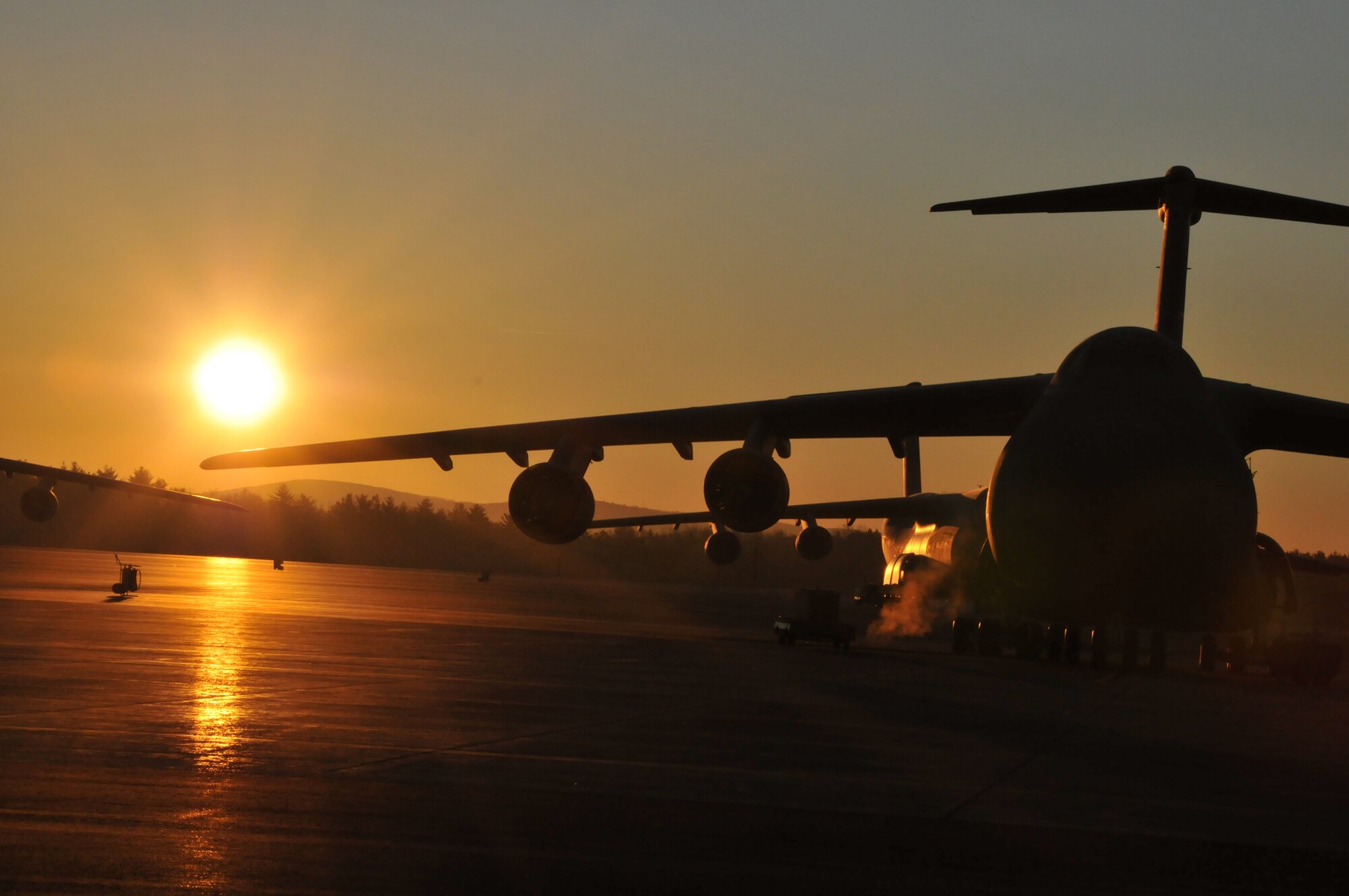 The sun rises over the Westover flight line Dec. 2. (US Air Force photo/MSgt. Andrew Biscoe)