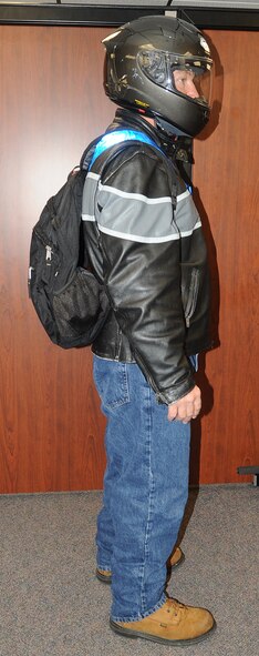 There are significant changes in the requirements for operating a motorcycle on base. The 4 SFS urges all motorcycle riders to read SJAFBI 31-218, paragraphs 4.2.3. through 4.2.3.4.5. to view changes applicable to motorcycle riders. This photo is an example of incorrect motorcycle personal protective equipment. (4th Fighter Wing Public Affairs courtesy photo)

