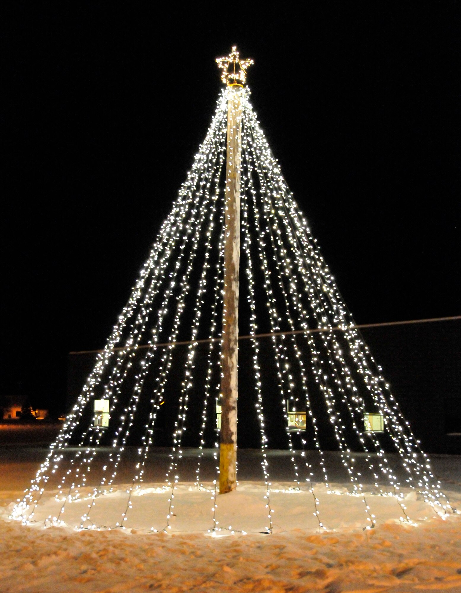 Members of the Iceman Team celebrated the arrival of the holiday season with the lighting of the base holiday tree at the base chapel, followed by the Family Holiday Celebration, sponsored by the 354th Force Support Squadron, at the Yukon Club Dec. 1.  (U.S. Air Force photo/Staff Sgt. Miguel Lara III)