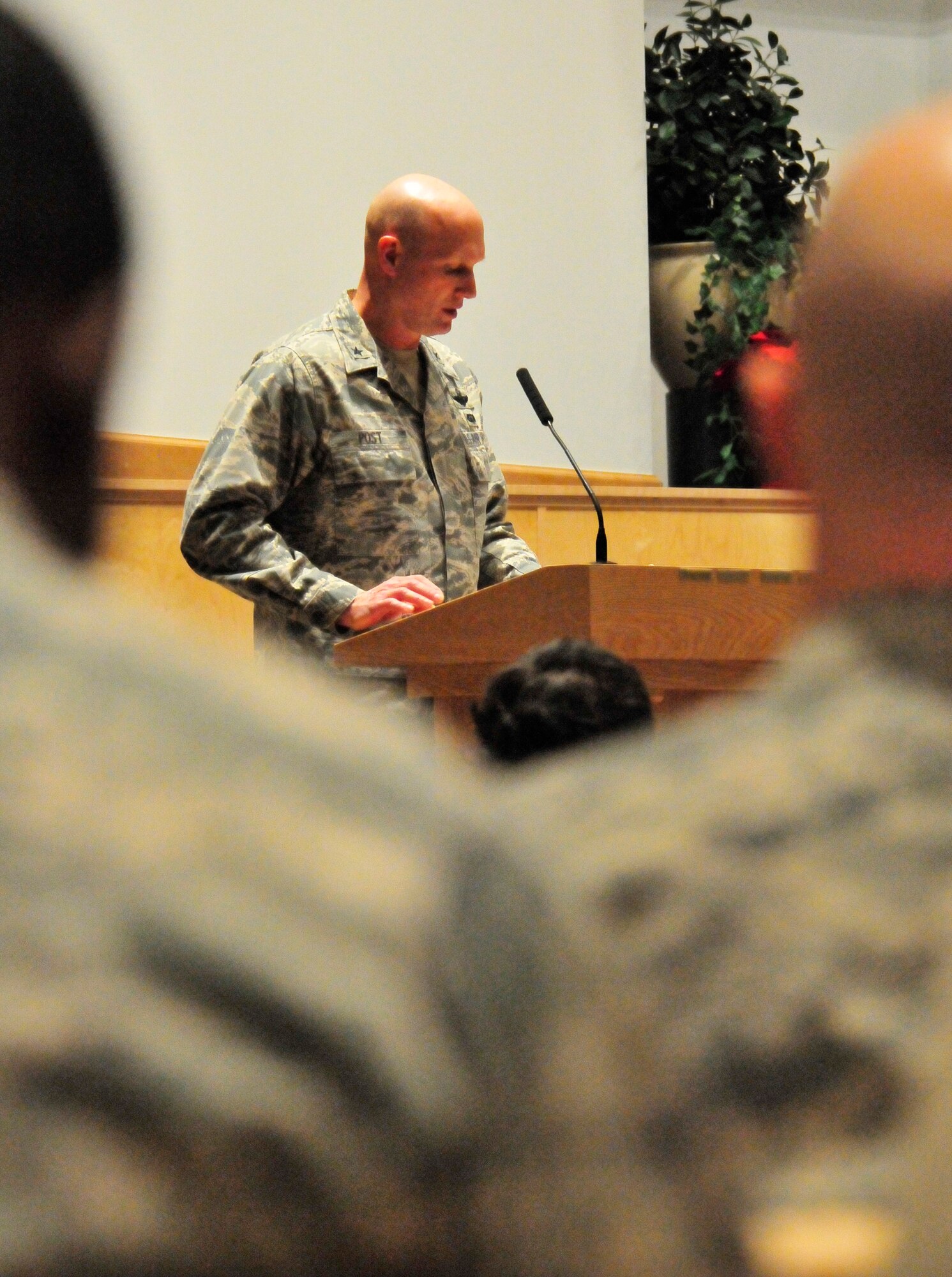 Brig. Gen. James Post, 354th Fighter Wing commander, speaks to members of the Iceman team at the base chapel here Dec. 1.  Families celebrated the arrival of the holiday season with the lighting of the base holiday tree, followed by the Family Holiday Celebration, which was sponsored by the 354th Force Support Squadron. (U.S. Air Force photo/Staff Sgt. Miguel Lara III)